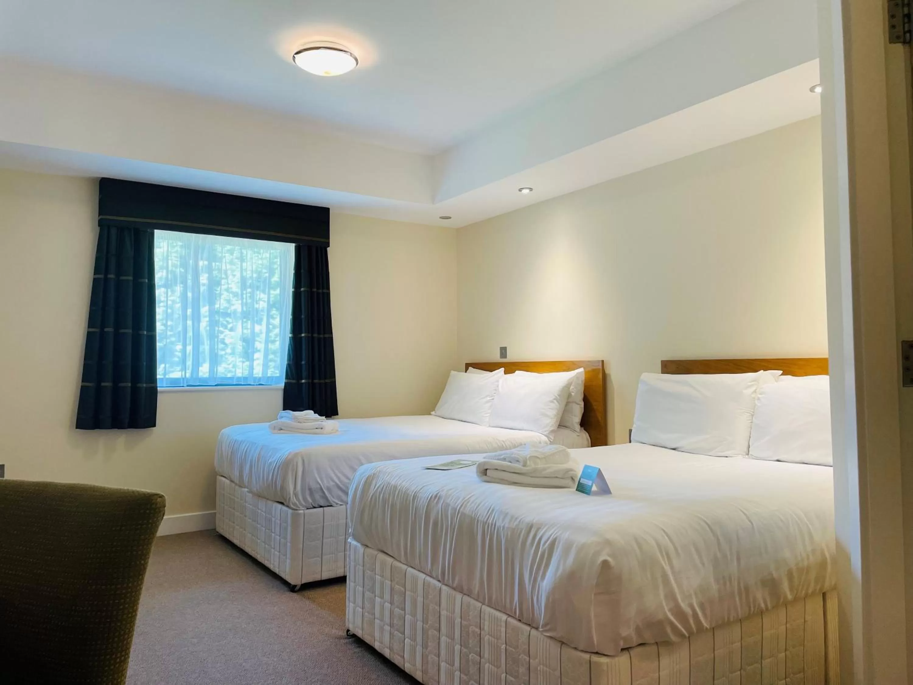 Deluxe Quadruple Room in Boston West Hotel