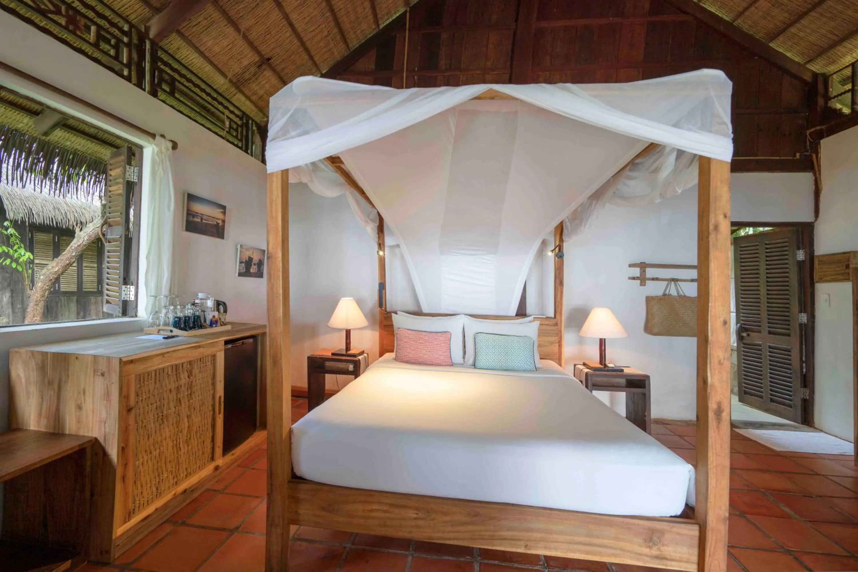 Bed in Mango Bay Resort