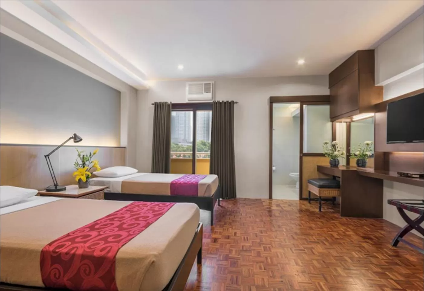 Bed in Tropicana Suites