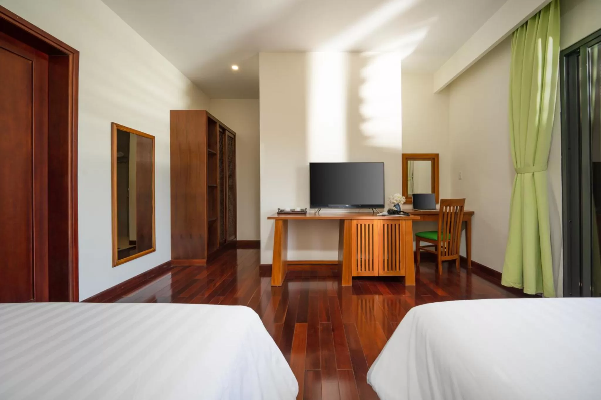 Bed, TV/Entertainment Center in Palm Village Hoian - STAY 24H