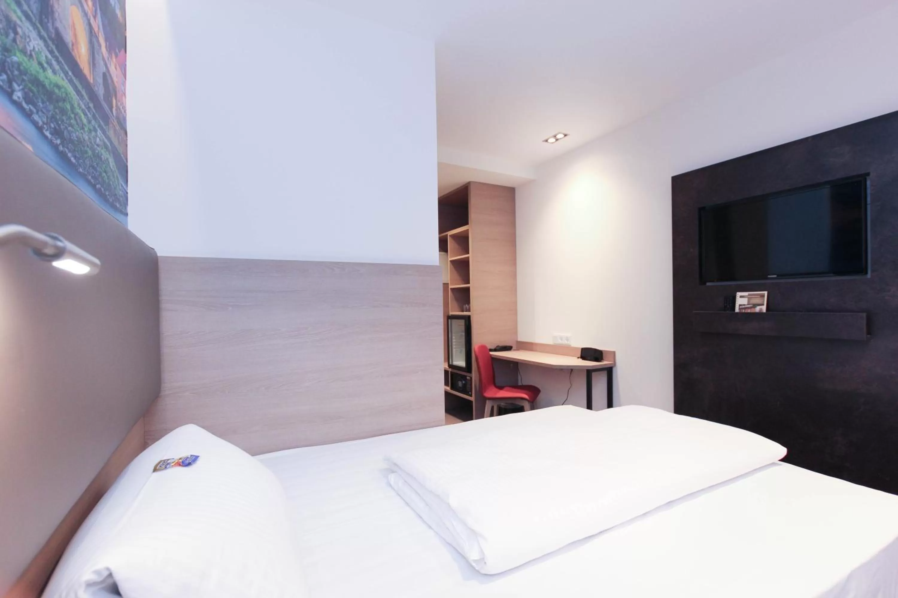 Bed in City Hotel Würzburg