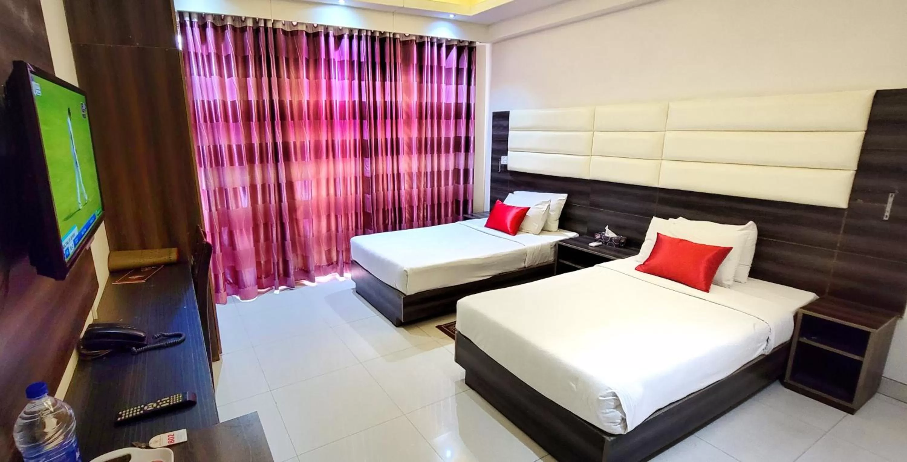 Bedroom, Bed in Hotel Afford Inn