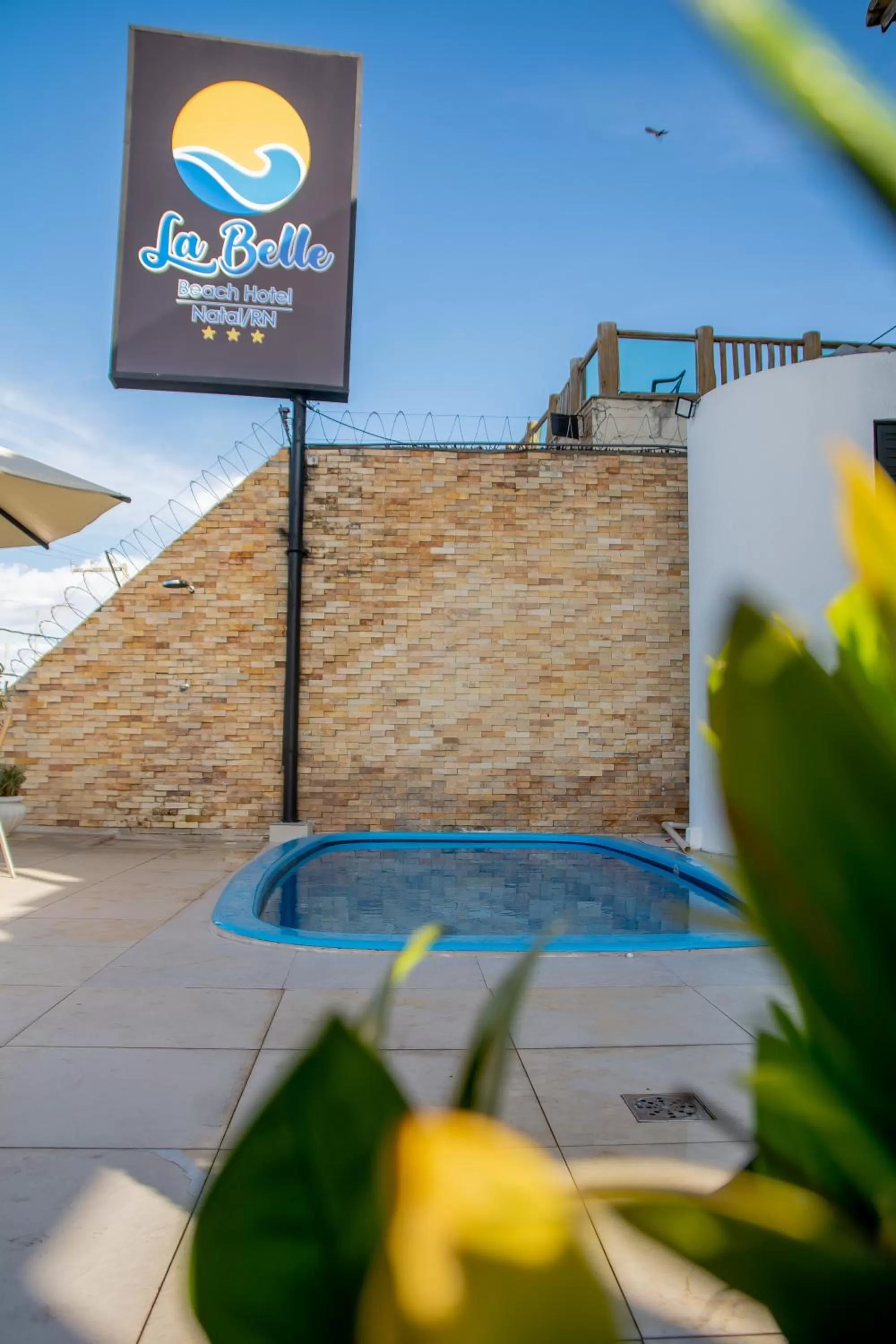 Property logo or sign in La Belle Beach Hotel