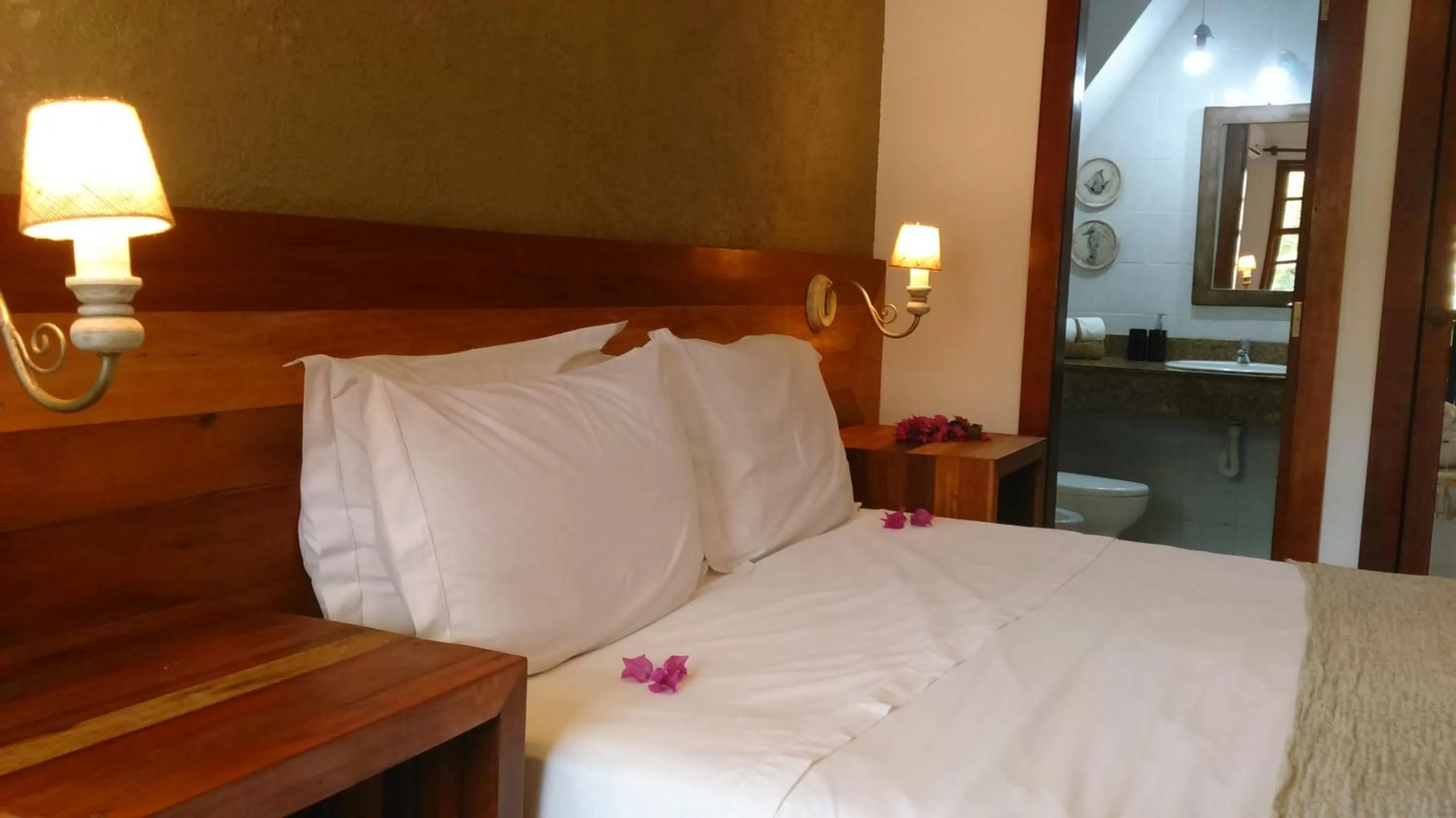 Bed in Pousada Praia João Fernandes