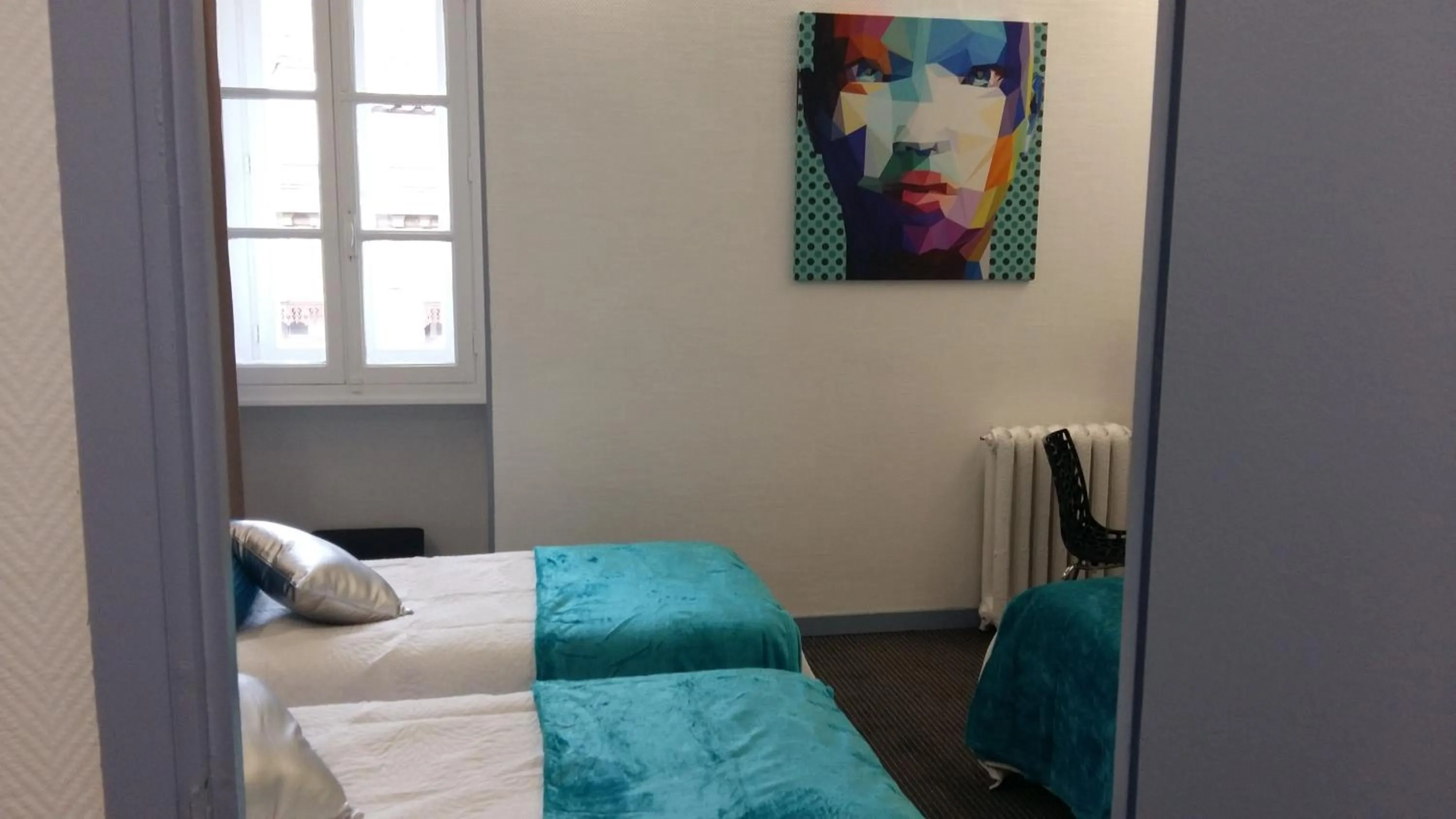 Photo of the whole room, Bed in Hôtel Le Capitole