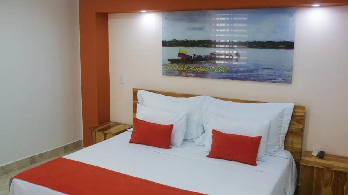 Bed in Kamaleb Farallones Hotel