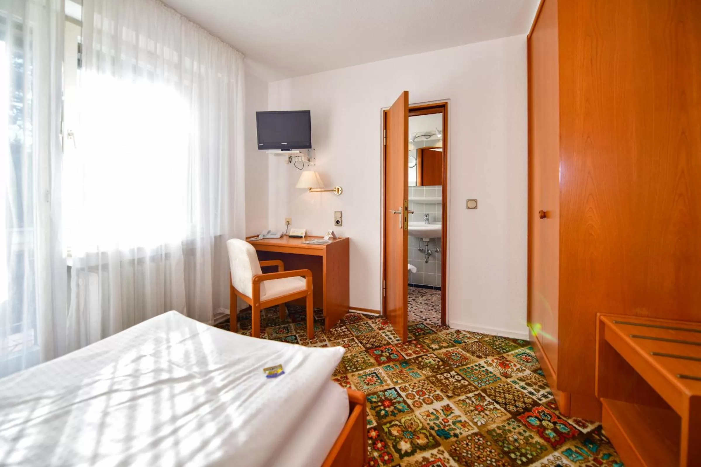 Bed in Hotel Zur Post