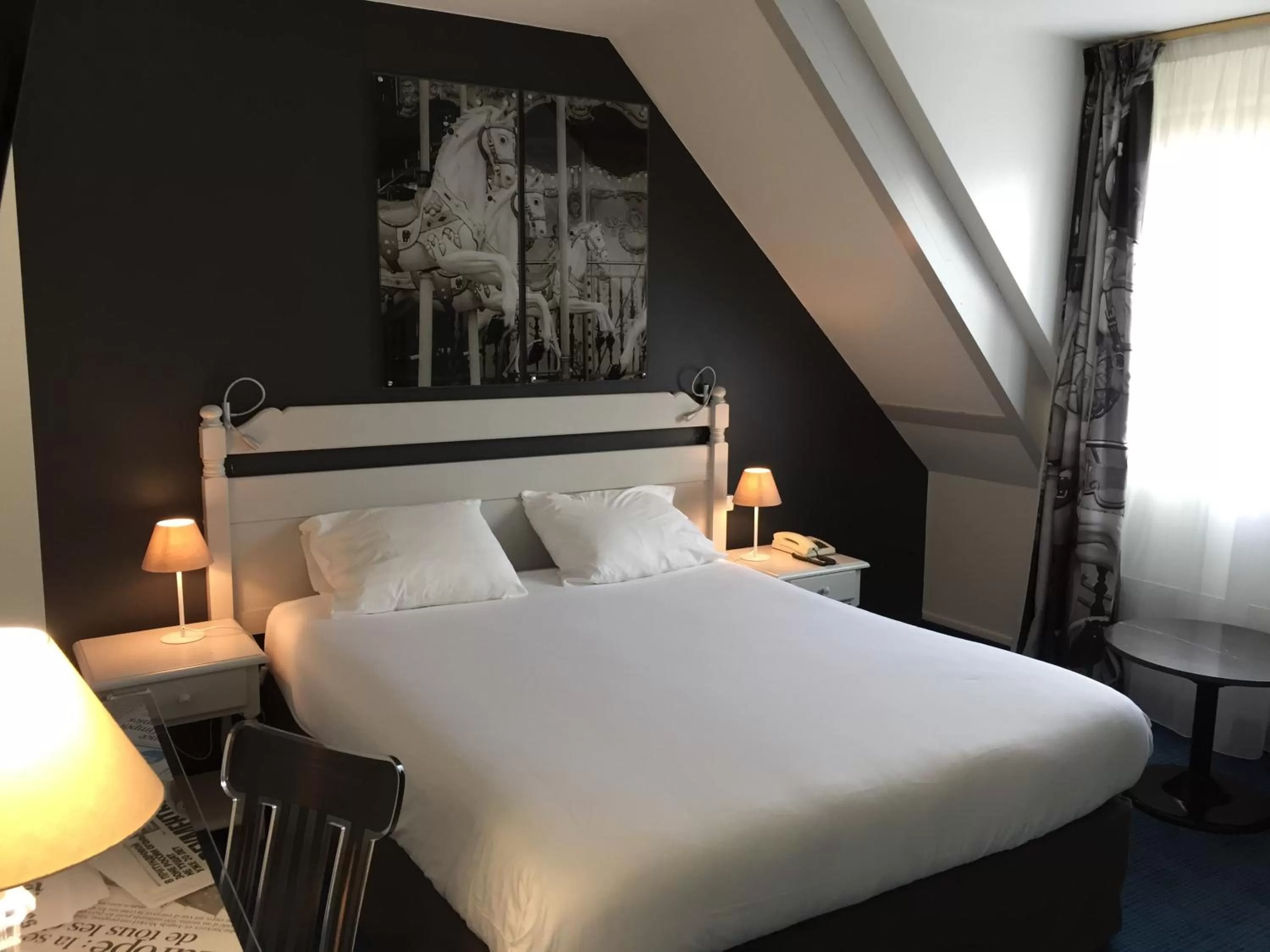 Photo of the whole room, Bed in Hotel Le Cardinal Rueil Centre