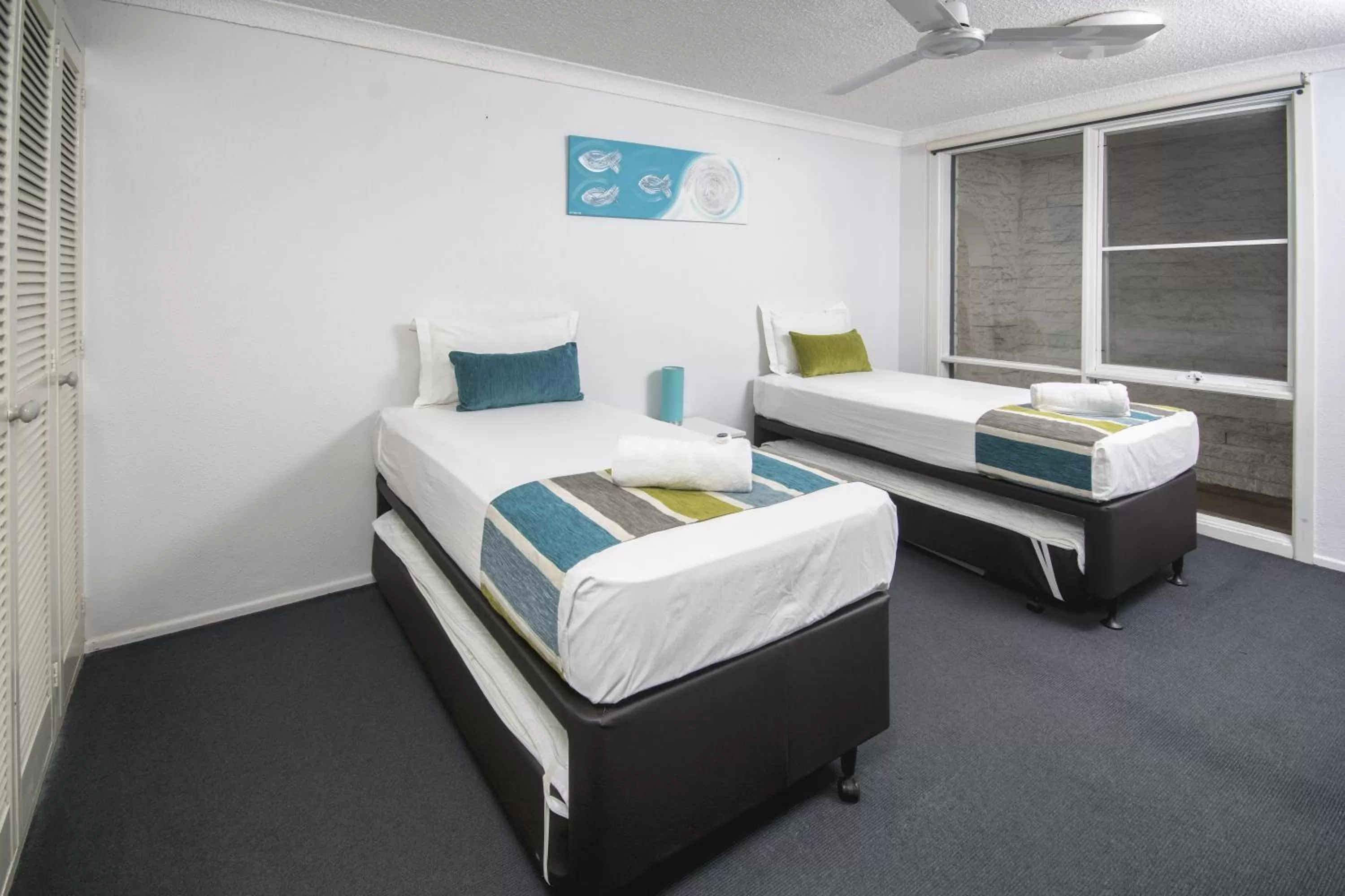 Bedroom, Bed in The Beach Motel Hervey Bay