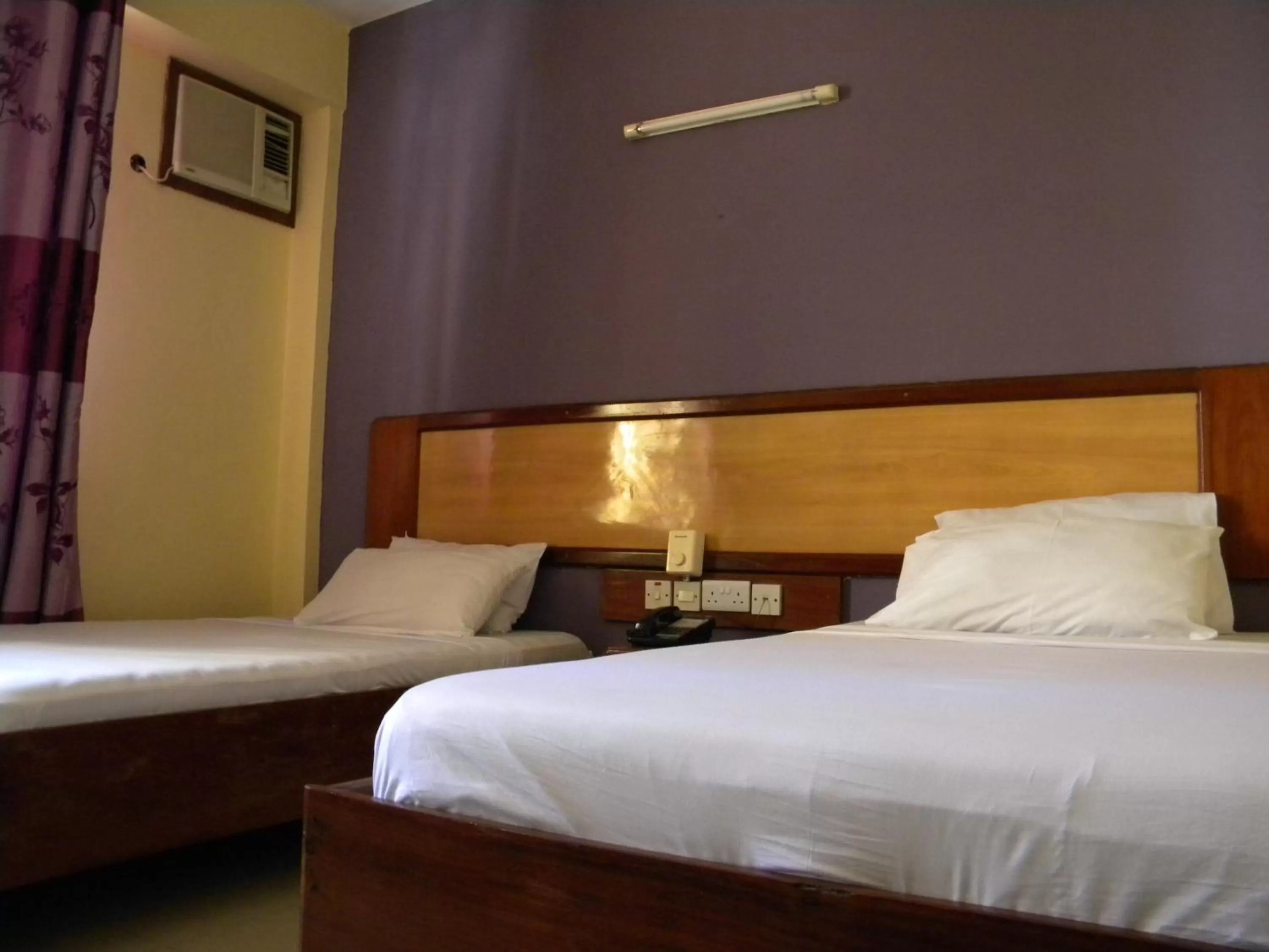 Bed in Iris Hotel Dar Es Salaam