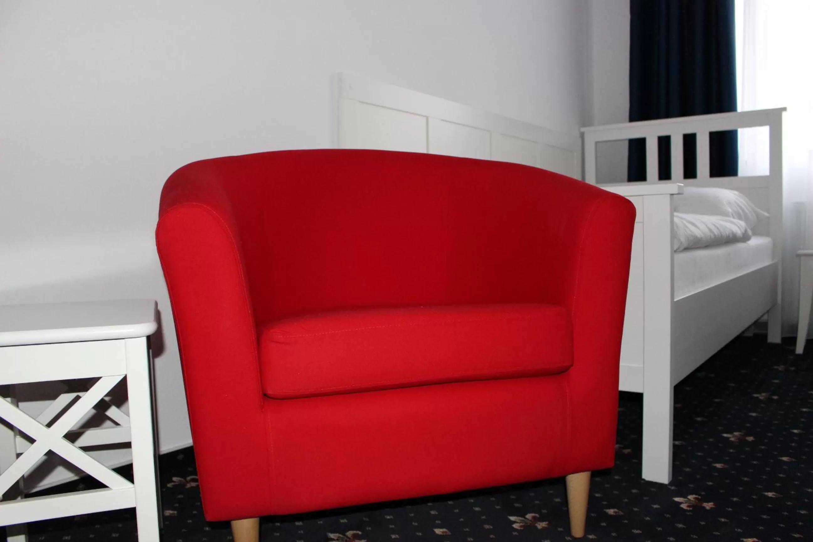 Seating area, Bed in Hotel Amadeus