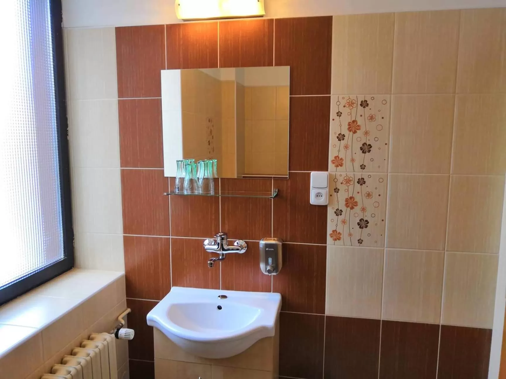 Bathroom in Hotel Alfa