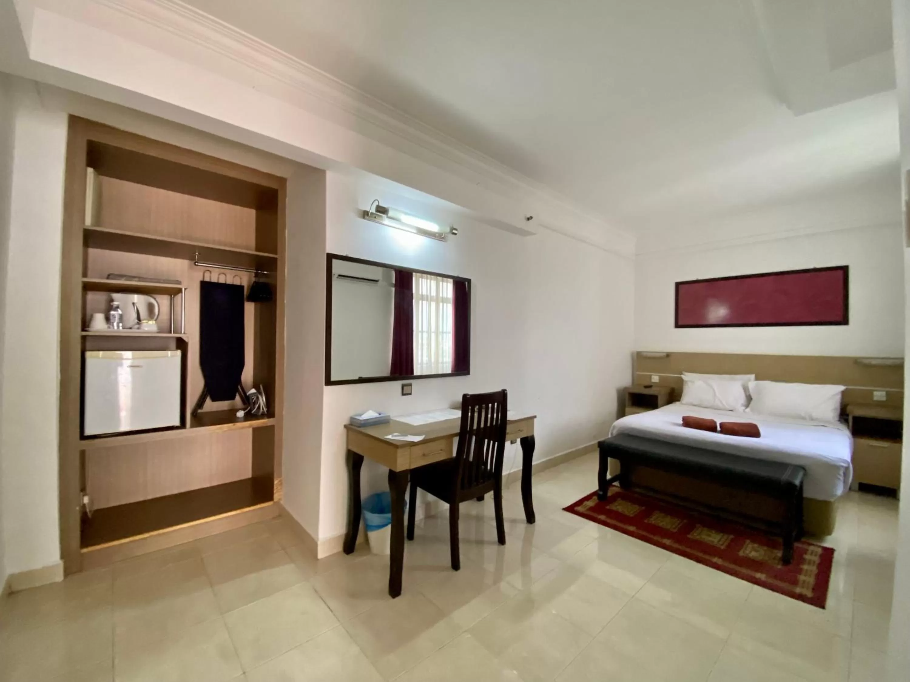 Bed in Sumai Hotel Apartment