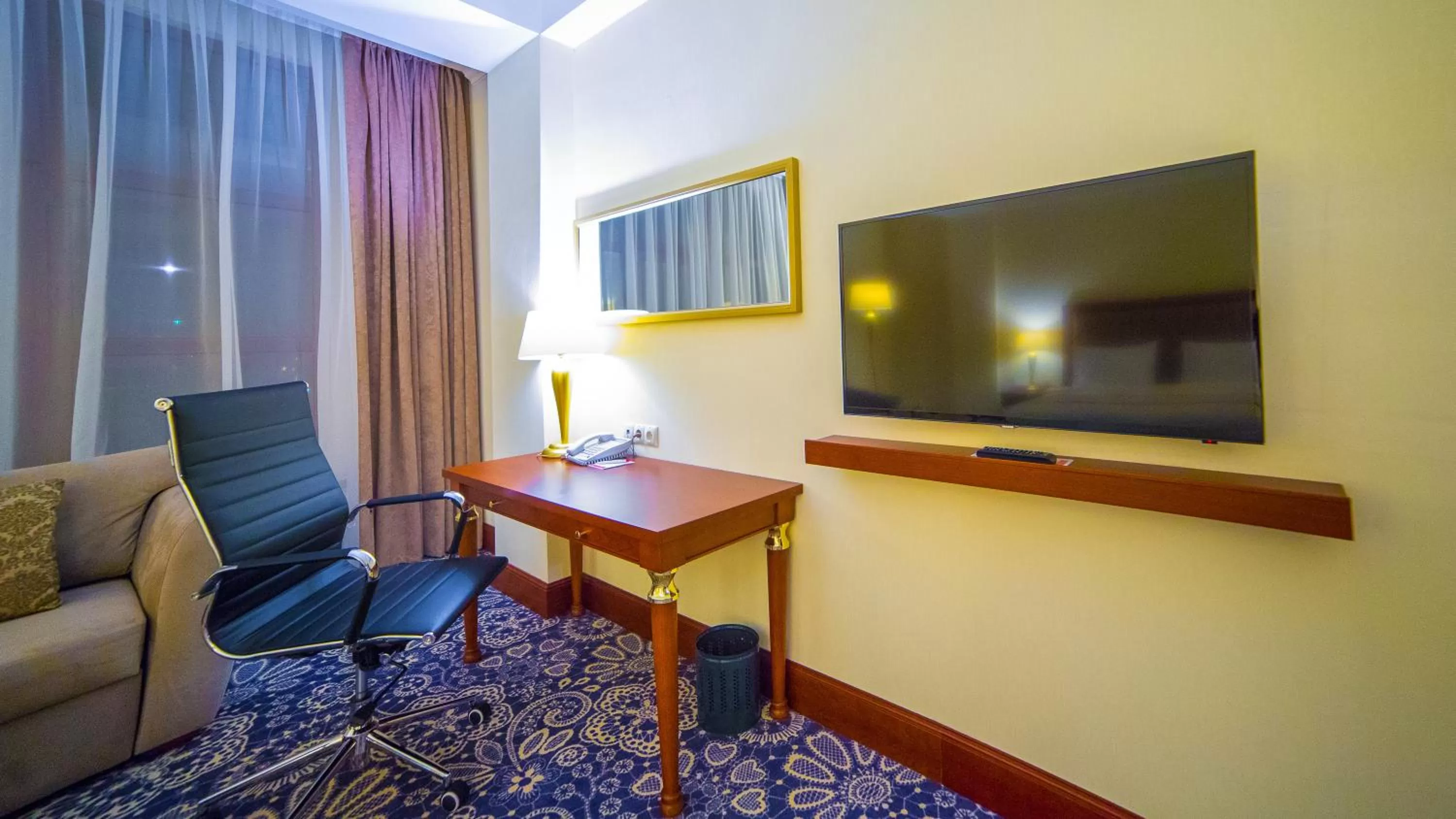 Business facilities in Ramada by Wyndham Almaty
