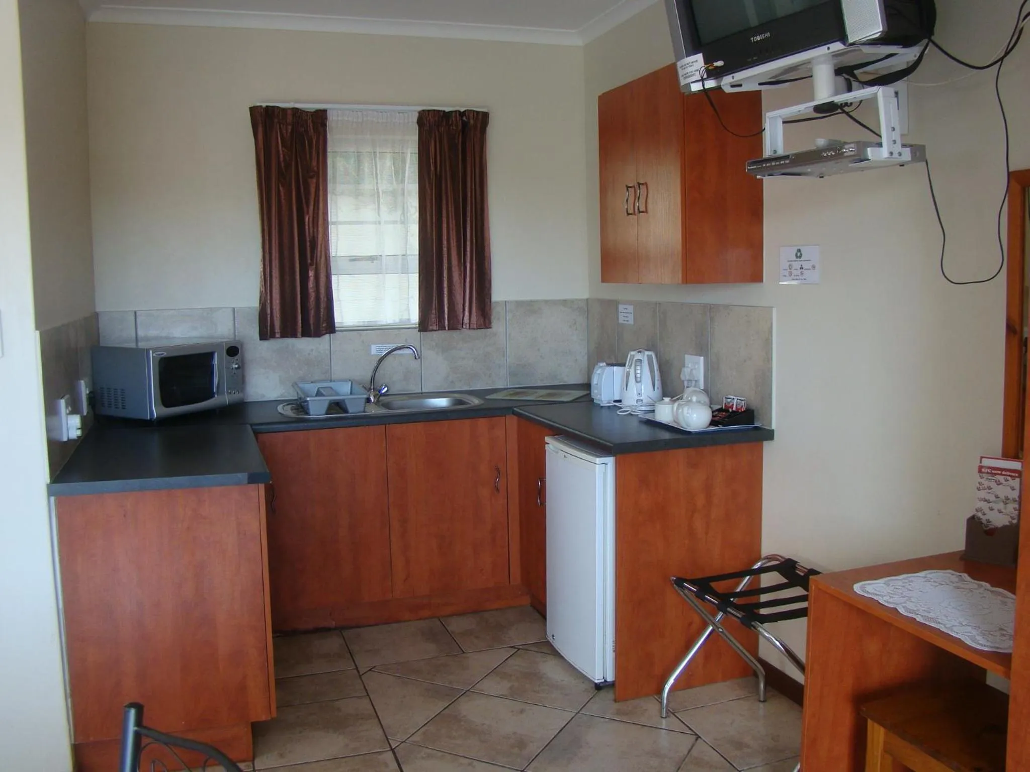 Kitchen or kitchenette in Aqua Marine Guest House