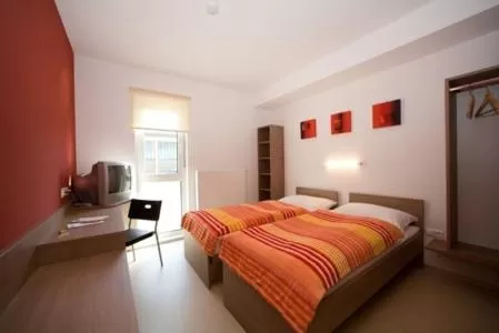 Bed in Nibelungenmotel Pöchlarn