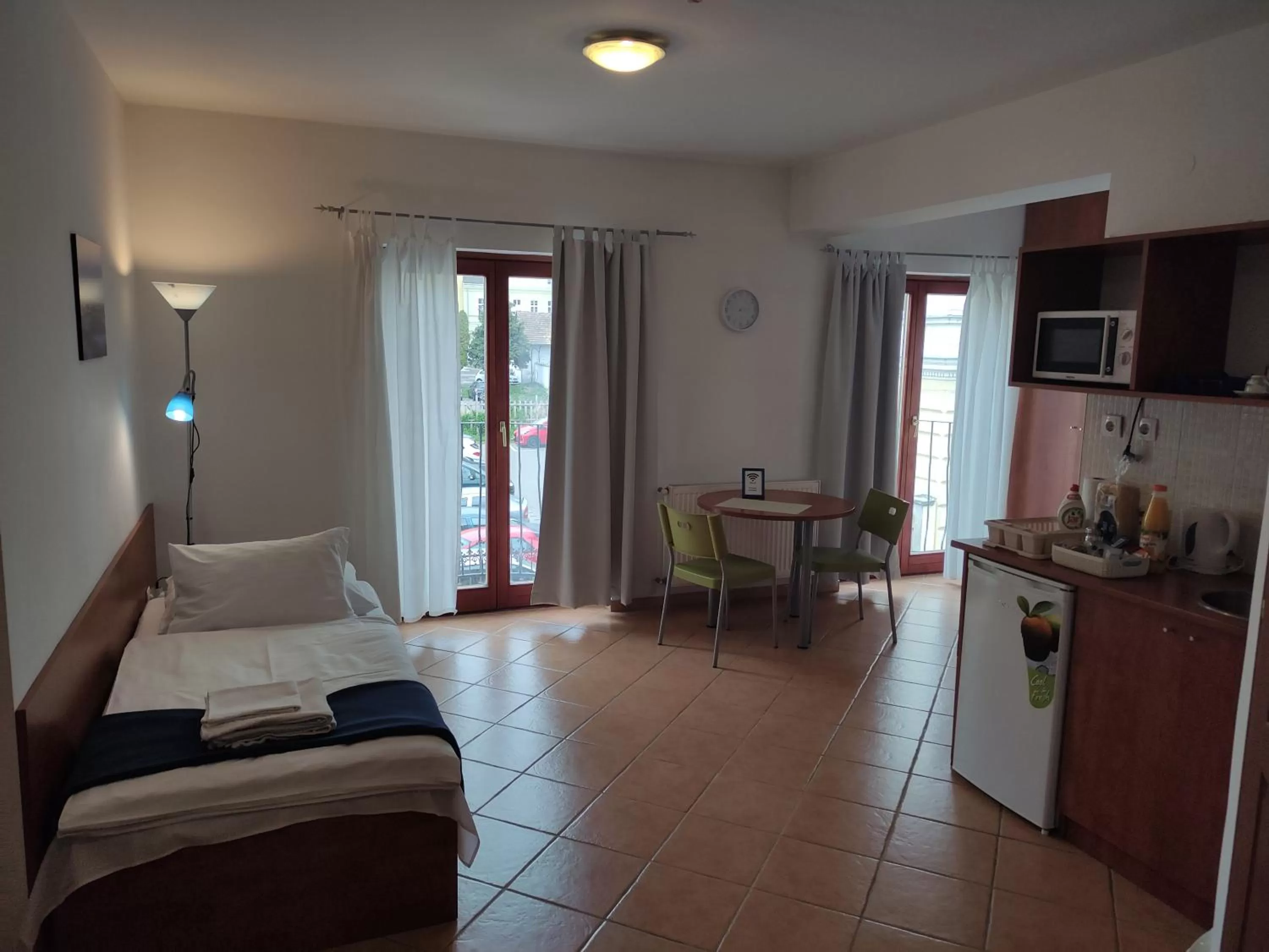 Bed in Szent Kristóf Apartmanhotel