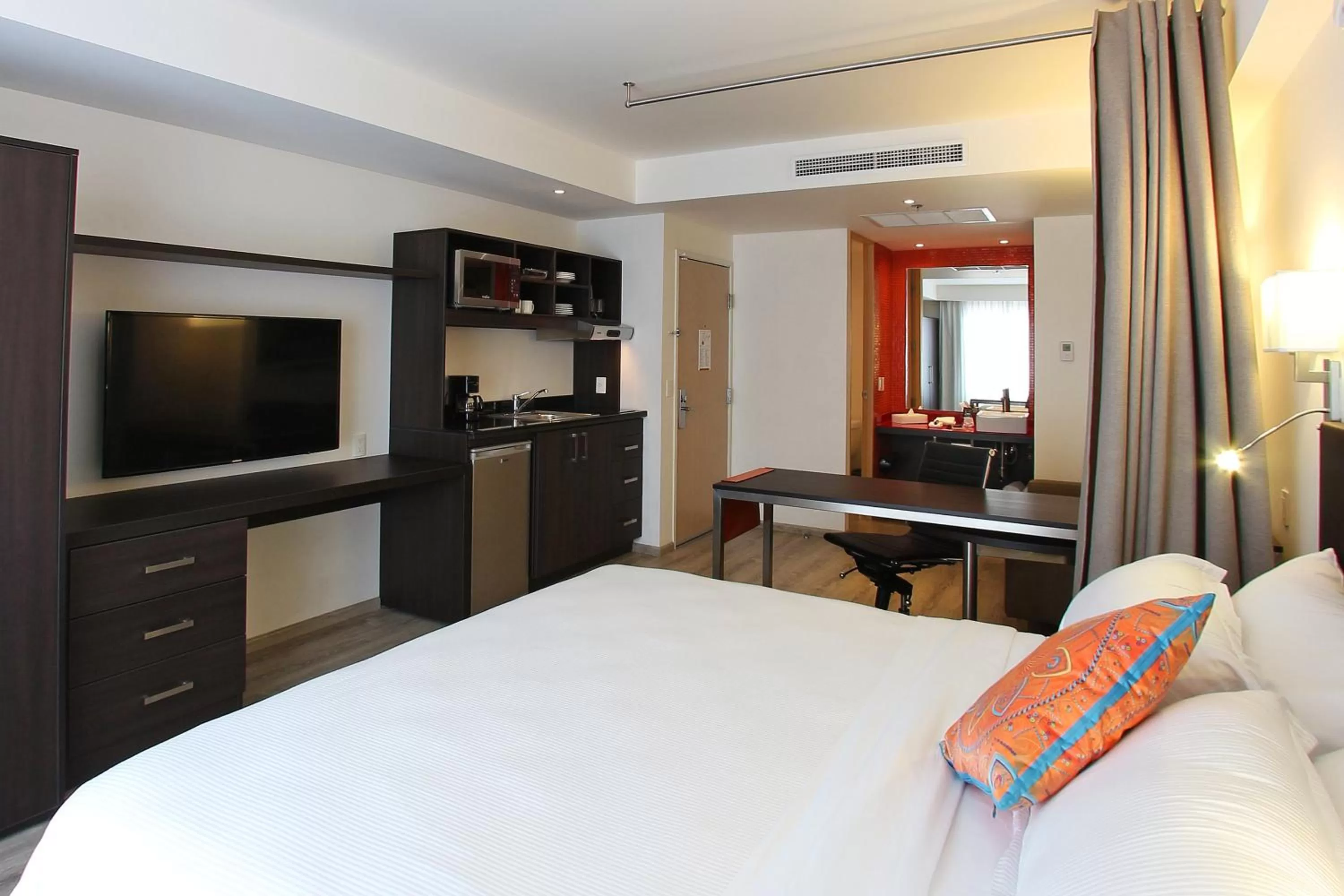 Photo of the whole room, Bed in Fiesta Inn Queretaro