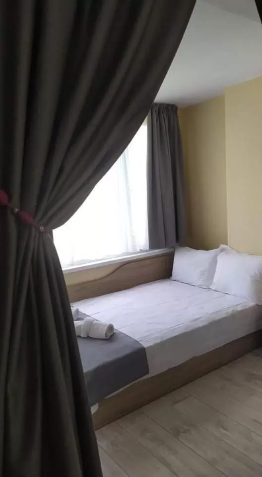 Bed in Family Hotel Malibu