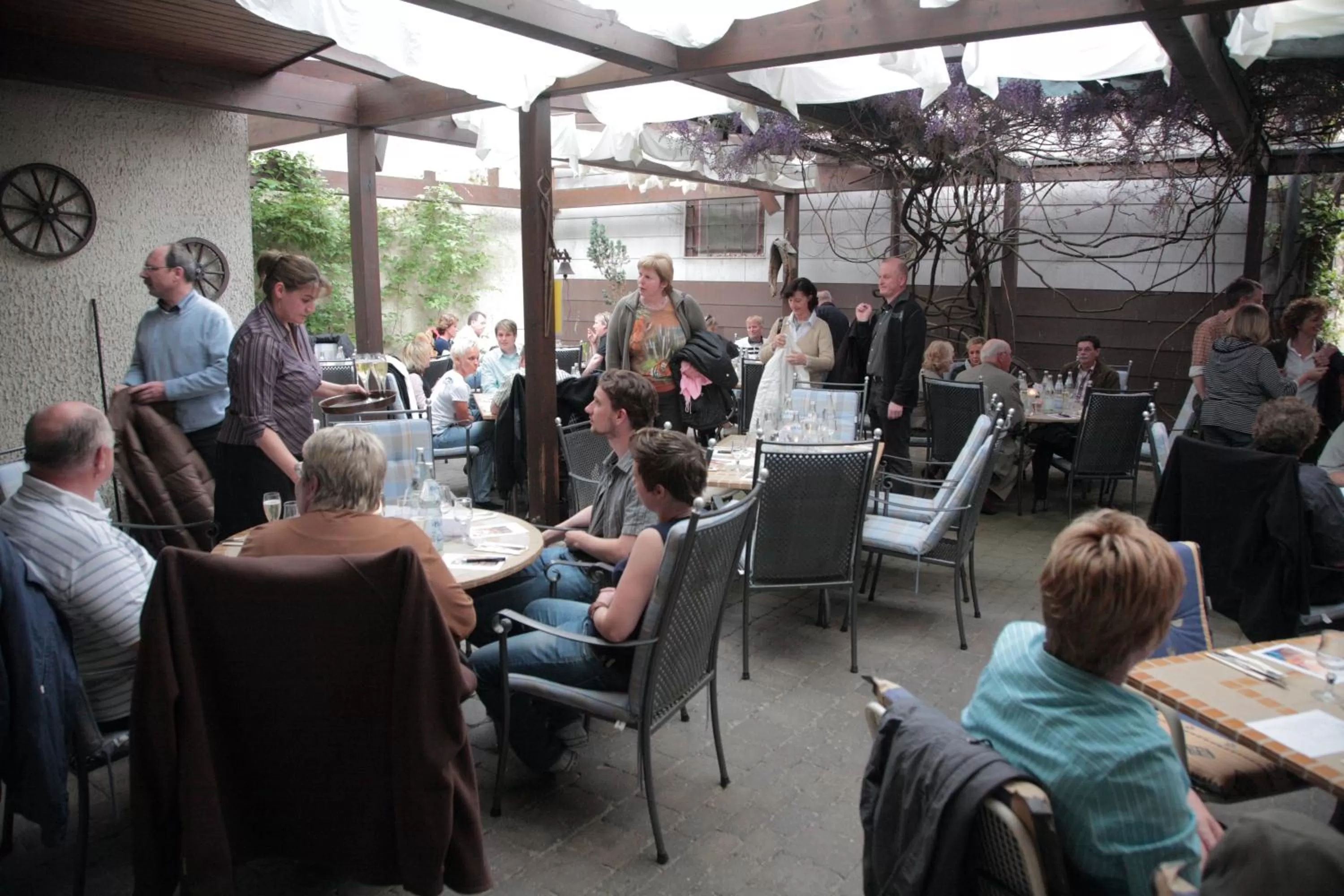 group of guests in Adler Gaststube Hotel Biergarten