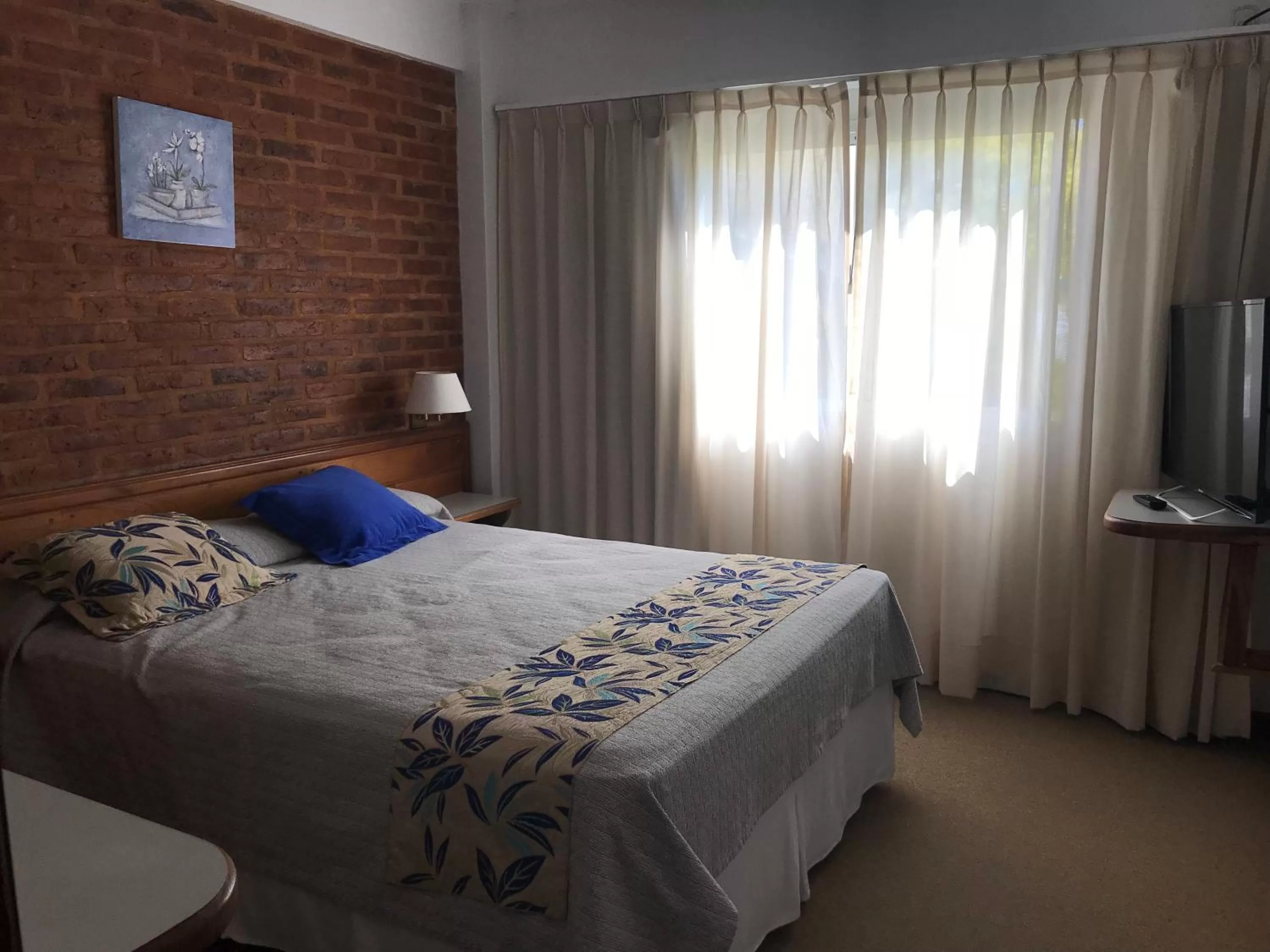 Bed in Costanera Mar Hotel & Suites