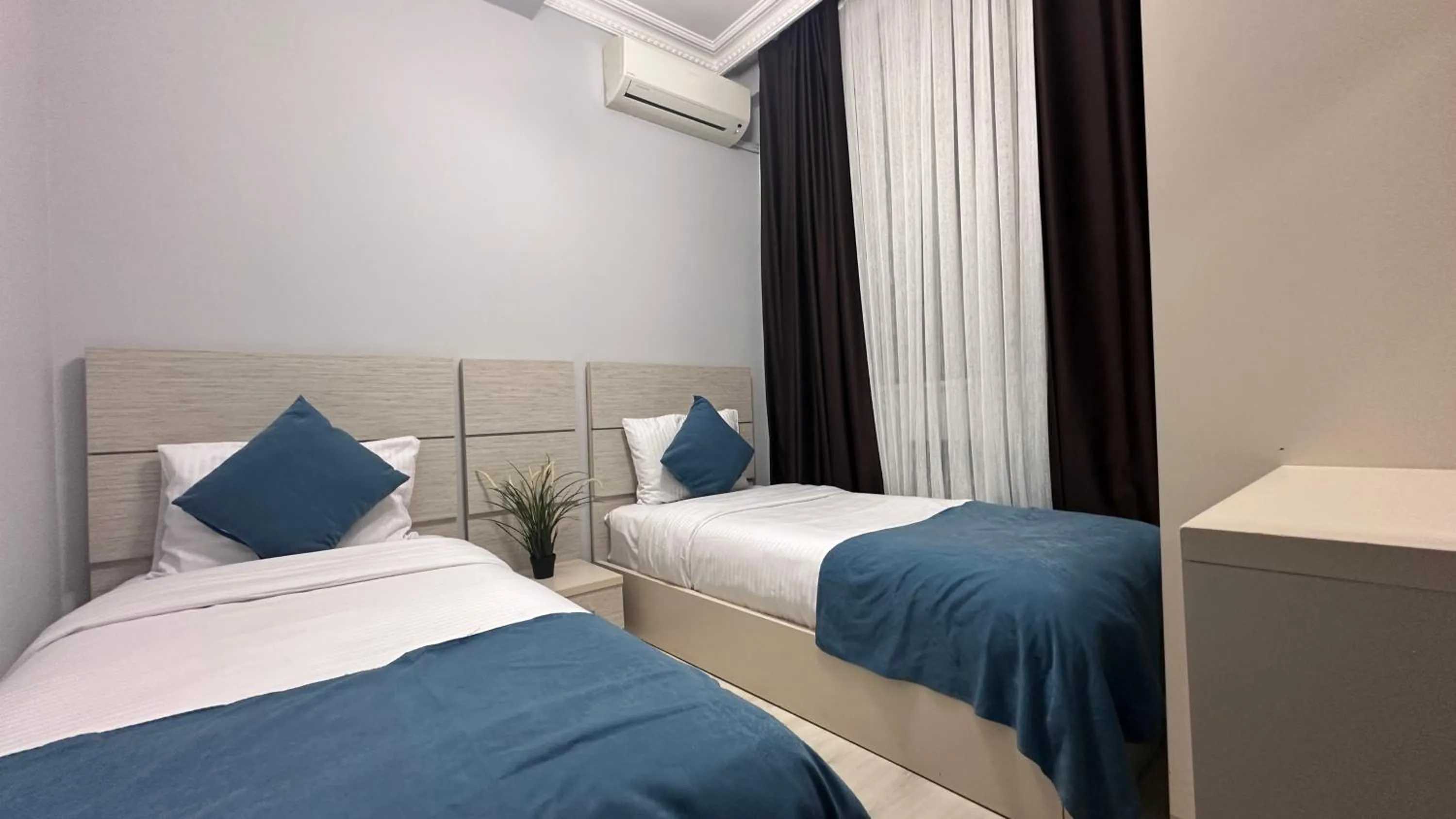 Bed in Overland Residence