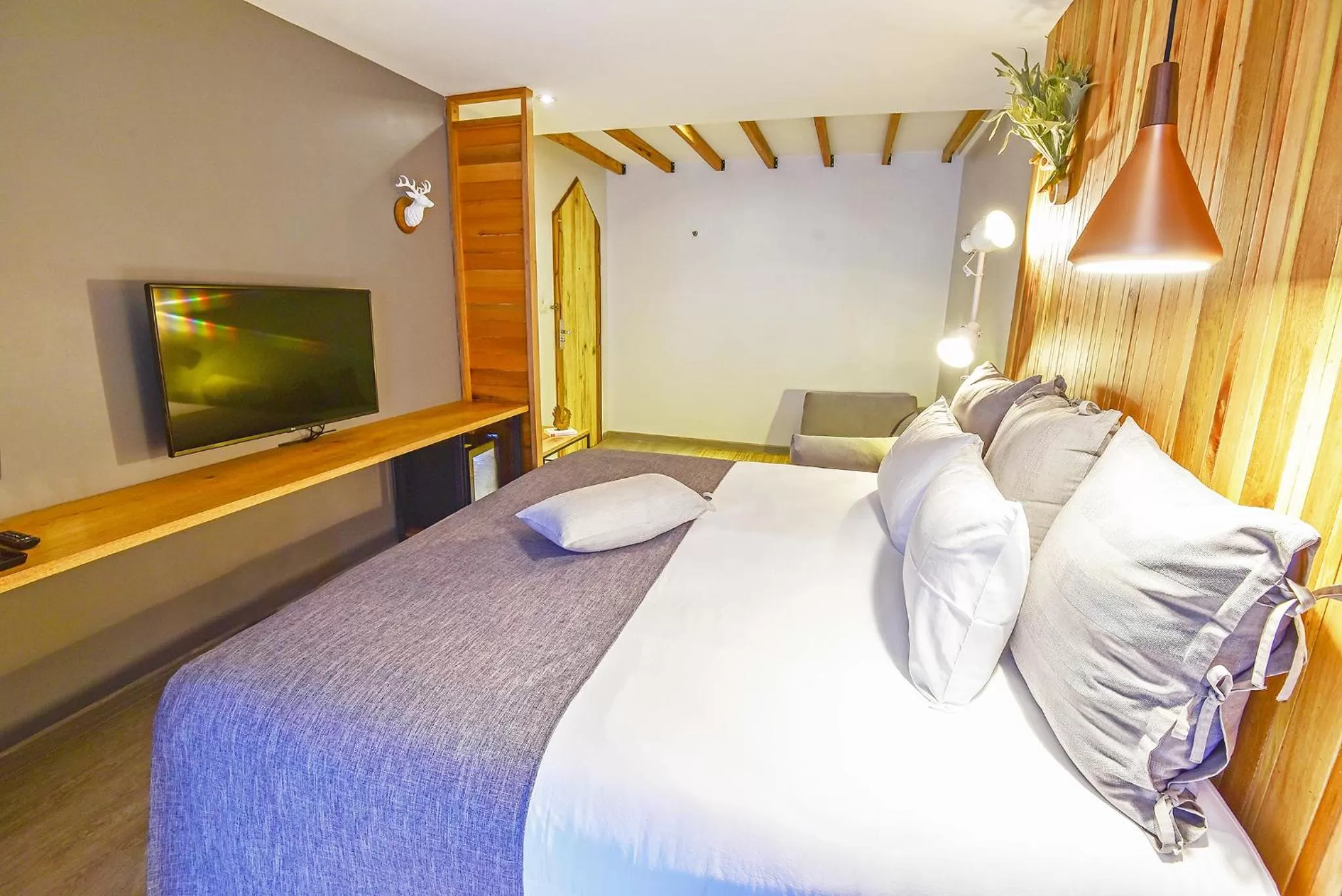 Bed in Family Tree Hotel