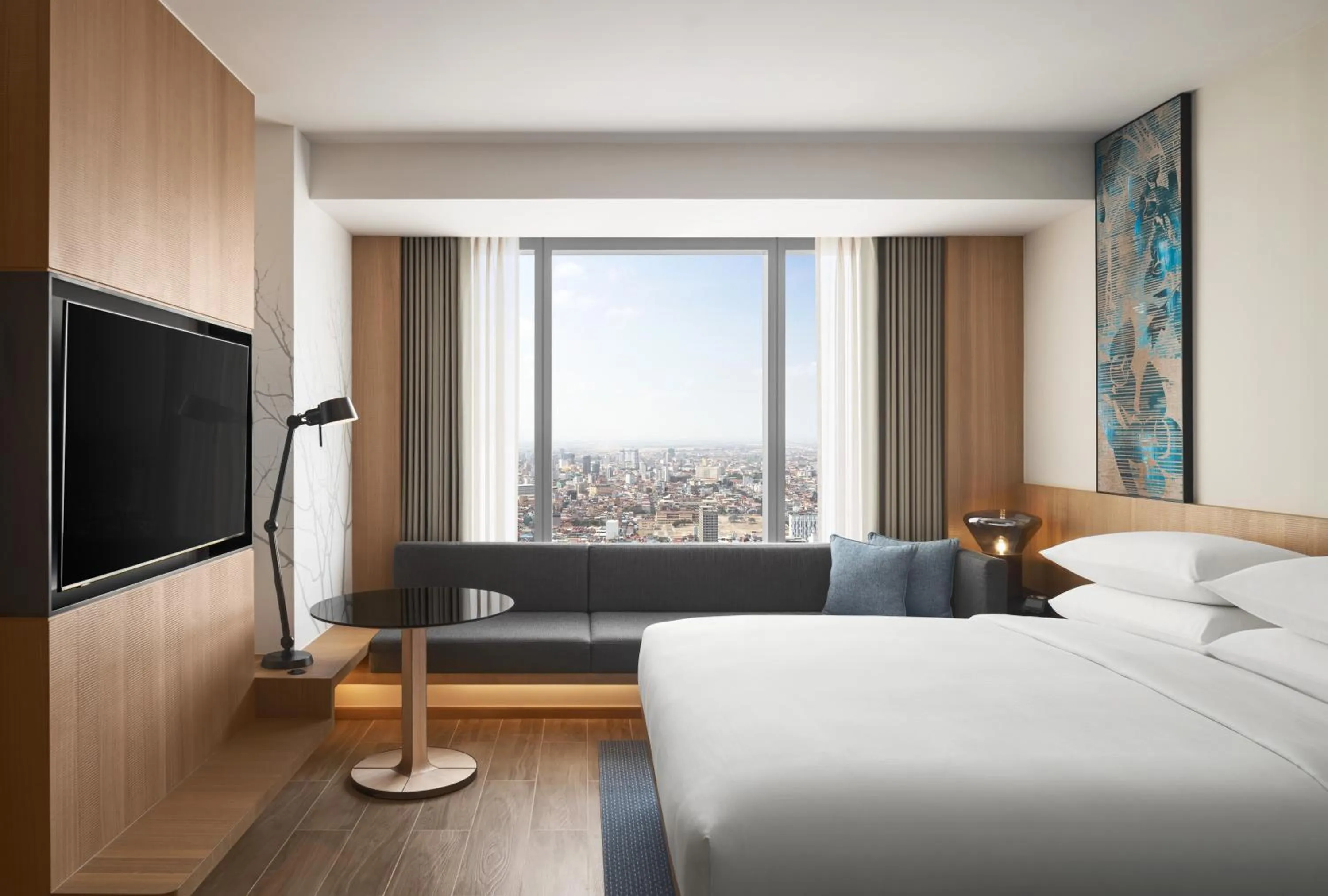 Communal lounge/ TV room, Bed in Fairfield by Marriott Phnom Penh