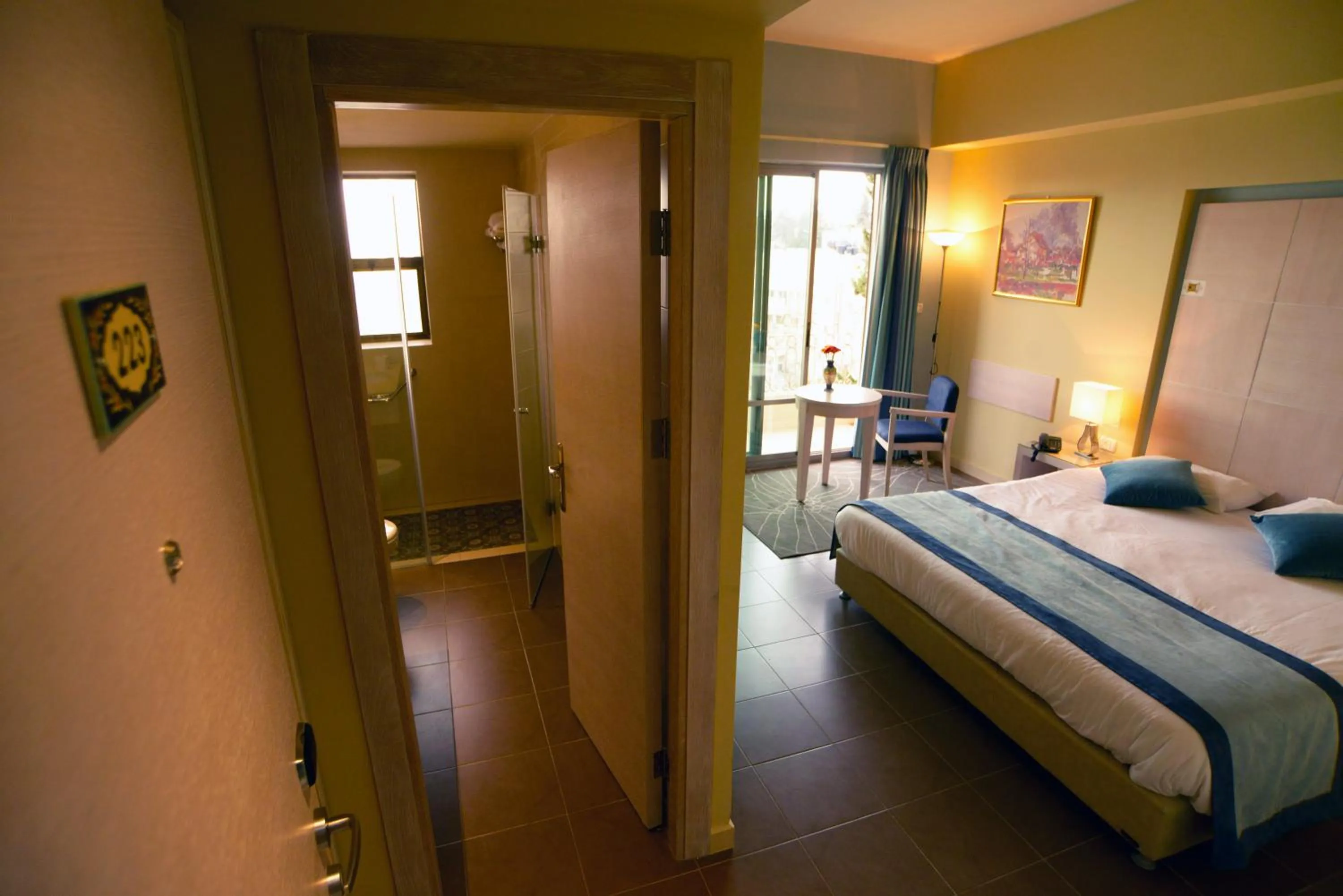 Photo of the whole room, Bed in Holy Land Hotel