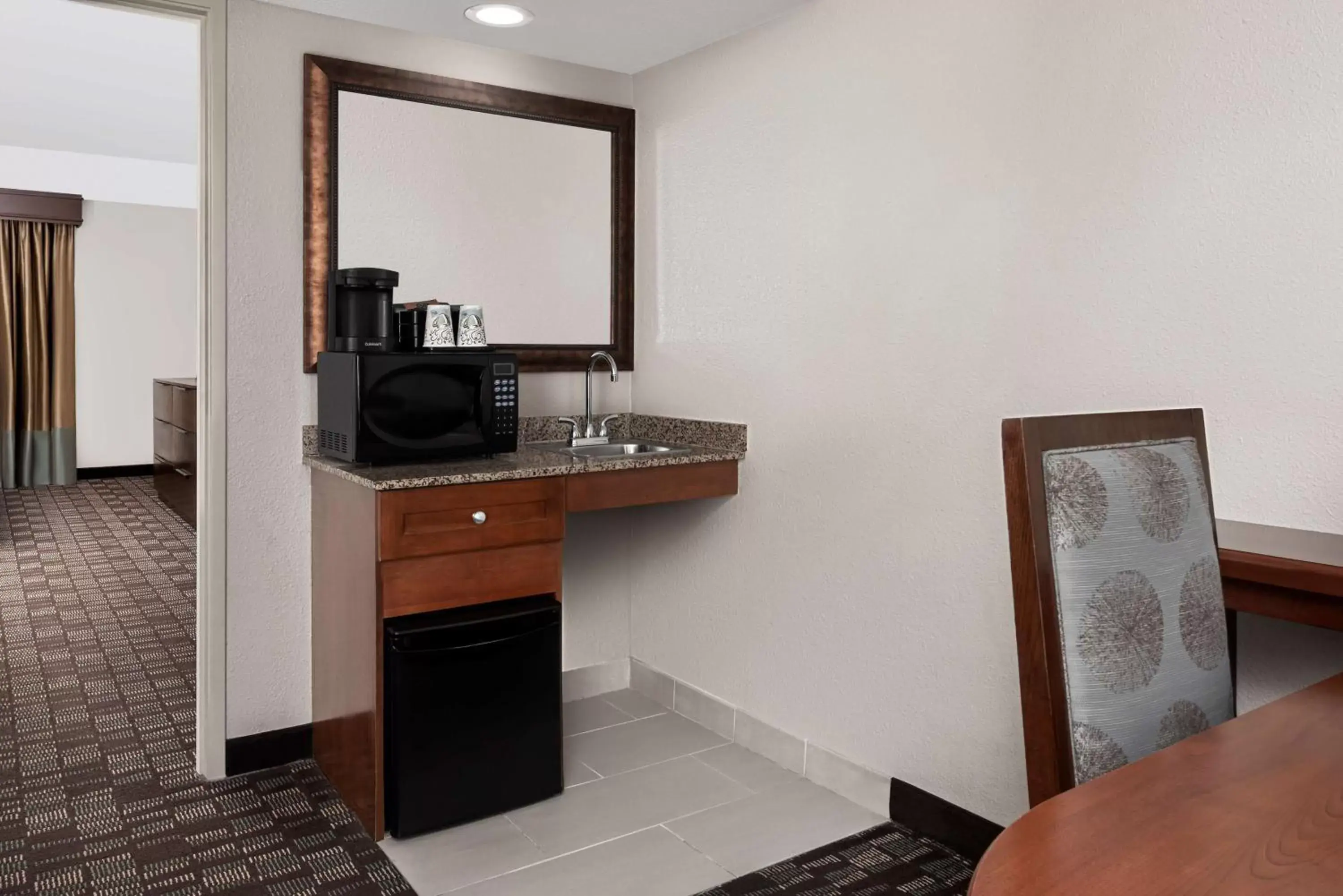 Premium King Room with Roll-In Shower - Mobility and Hearing Accessible/Non-Smoking in Embassy Suites by Hilton Nashville Airport Premium King Room with Roll-In Shower - Mobility and Hearing Accessible/Non-Smoking in Embassy Suites by Hilton Nashville Airport
