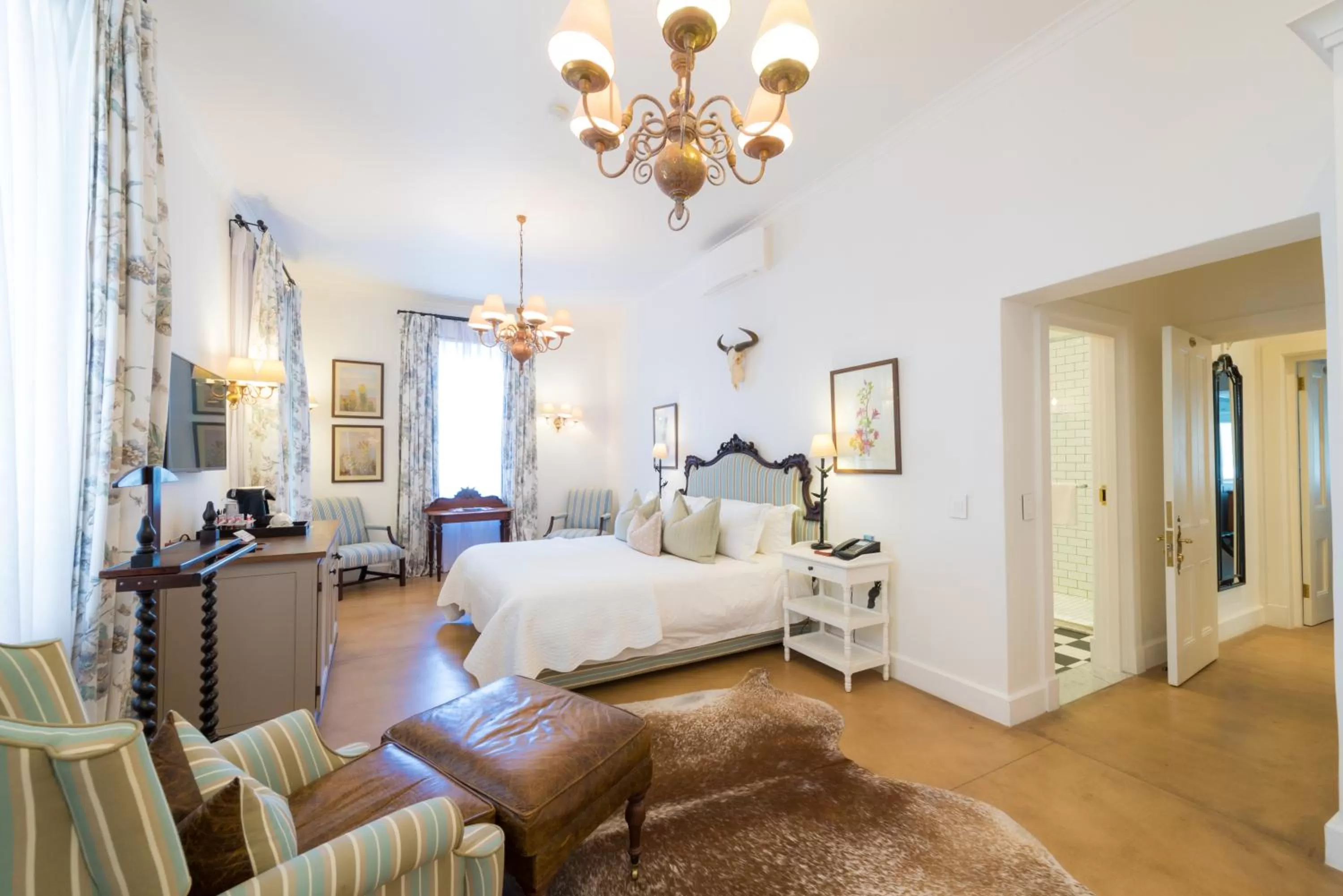 Seating area, Bed in Drostdy Hotel