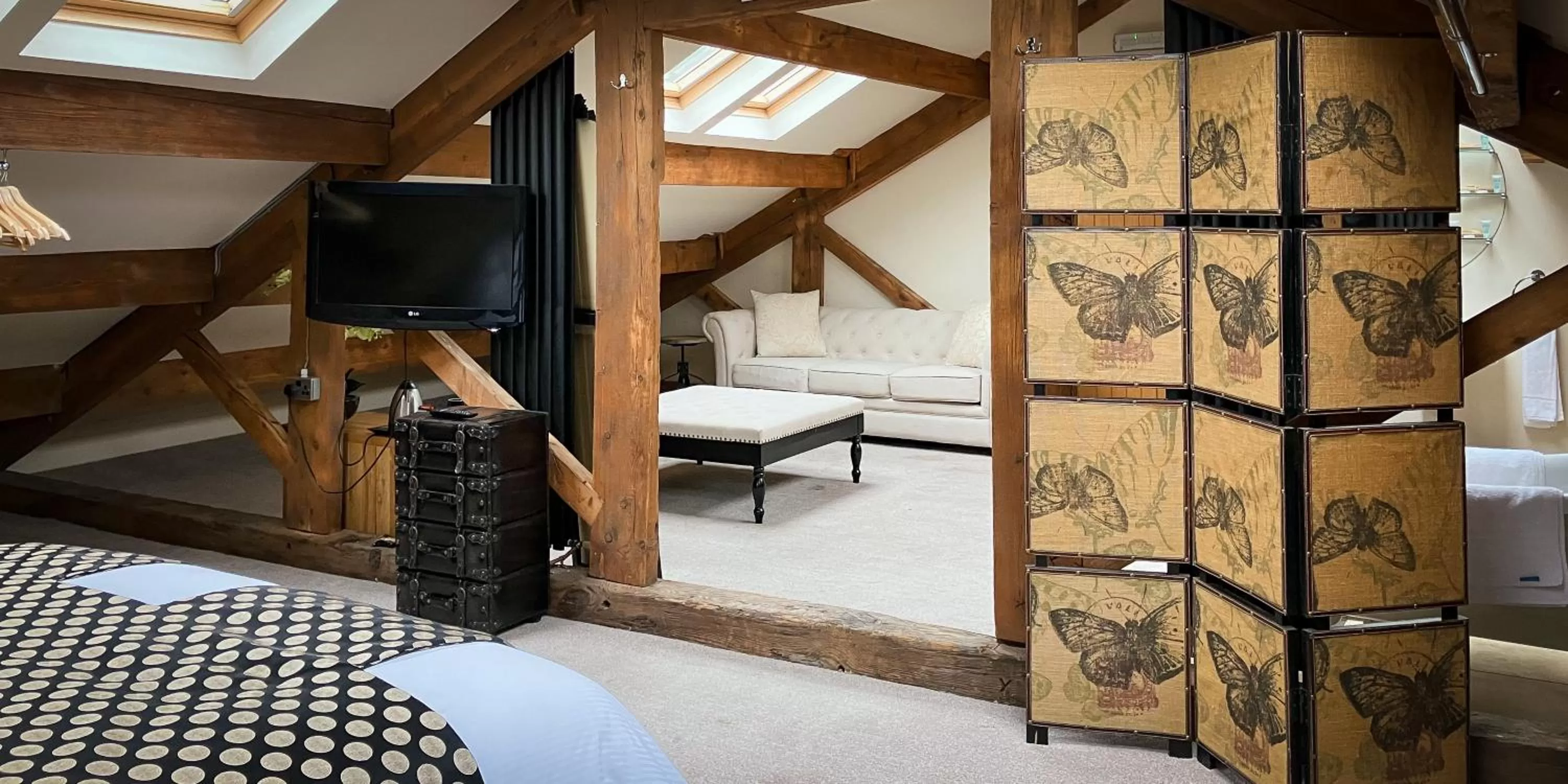 Bedroom, TV/Entertainment Center in The Weavers Shed