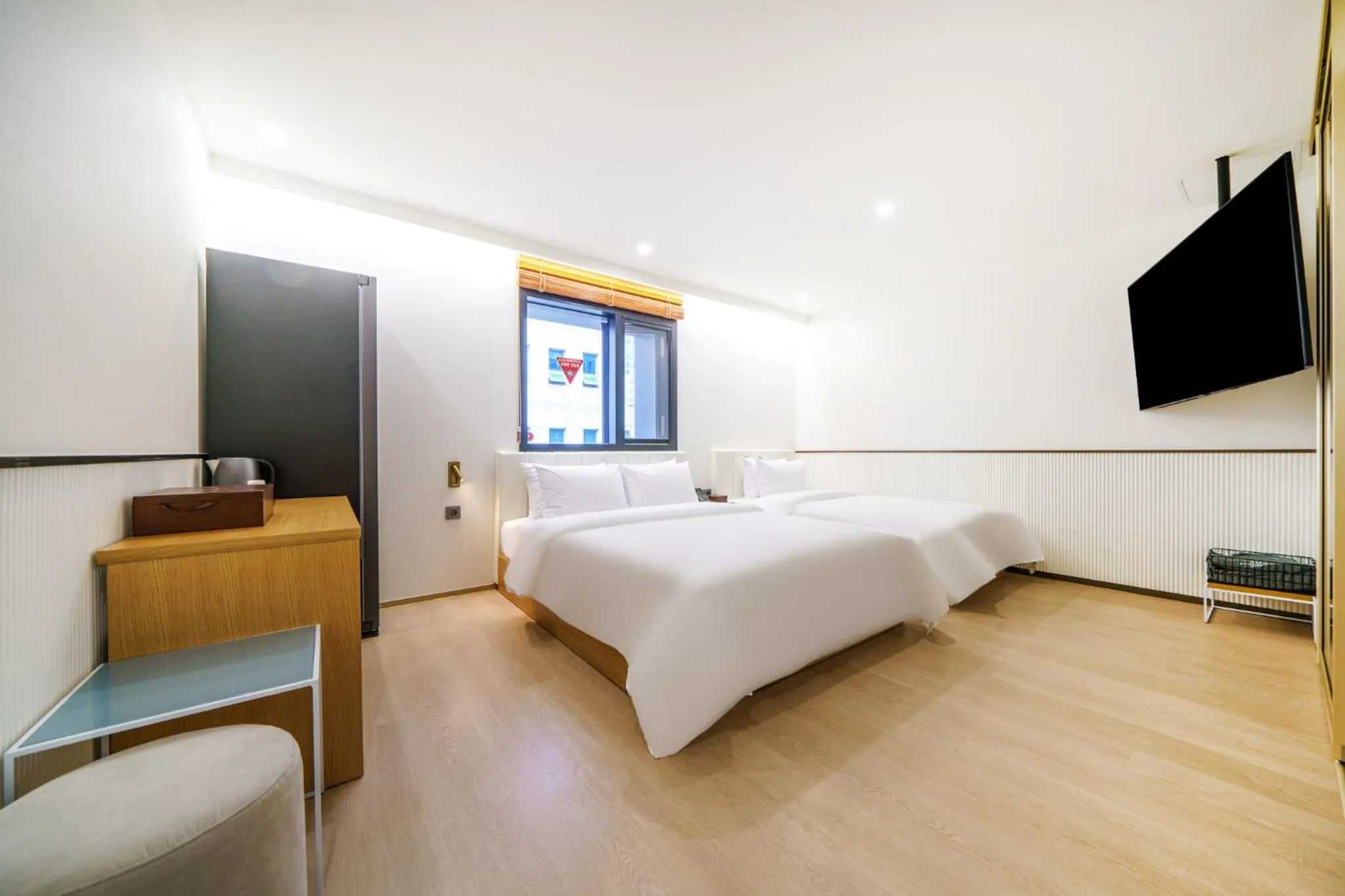 Bed in Jjak Boutique Hotel