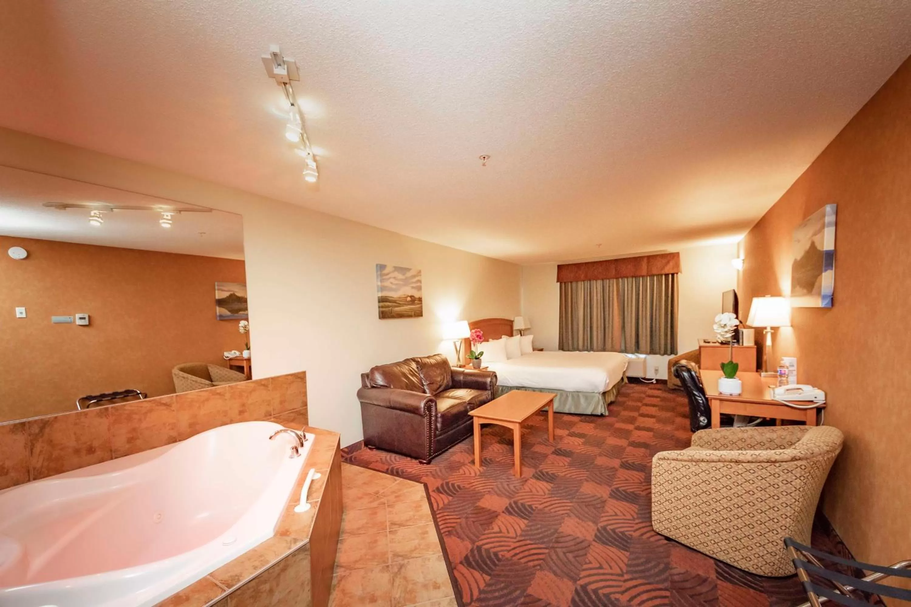King Suite with Spa Bath - Non-Smoking in SureStay Plus by Best Western Calgary South East