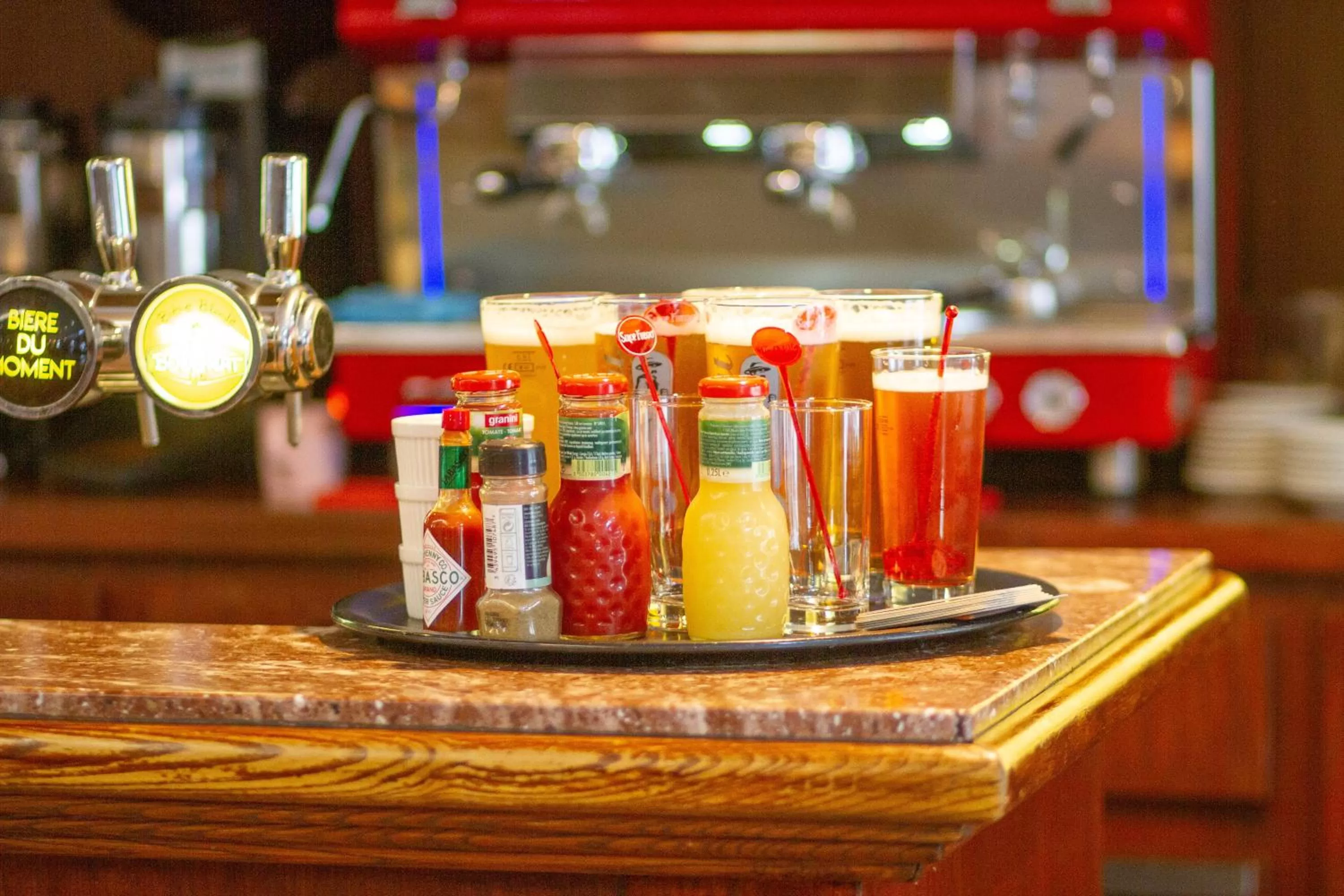 Lounge or bar in Le CESAR HOTEL