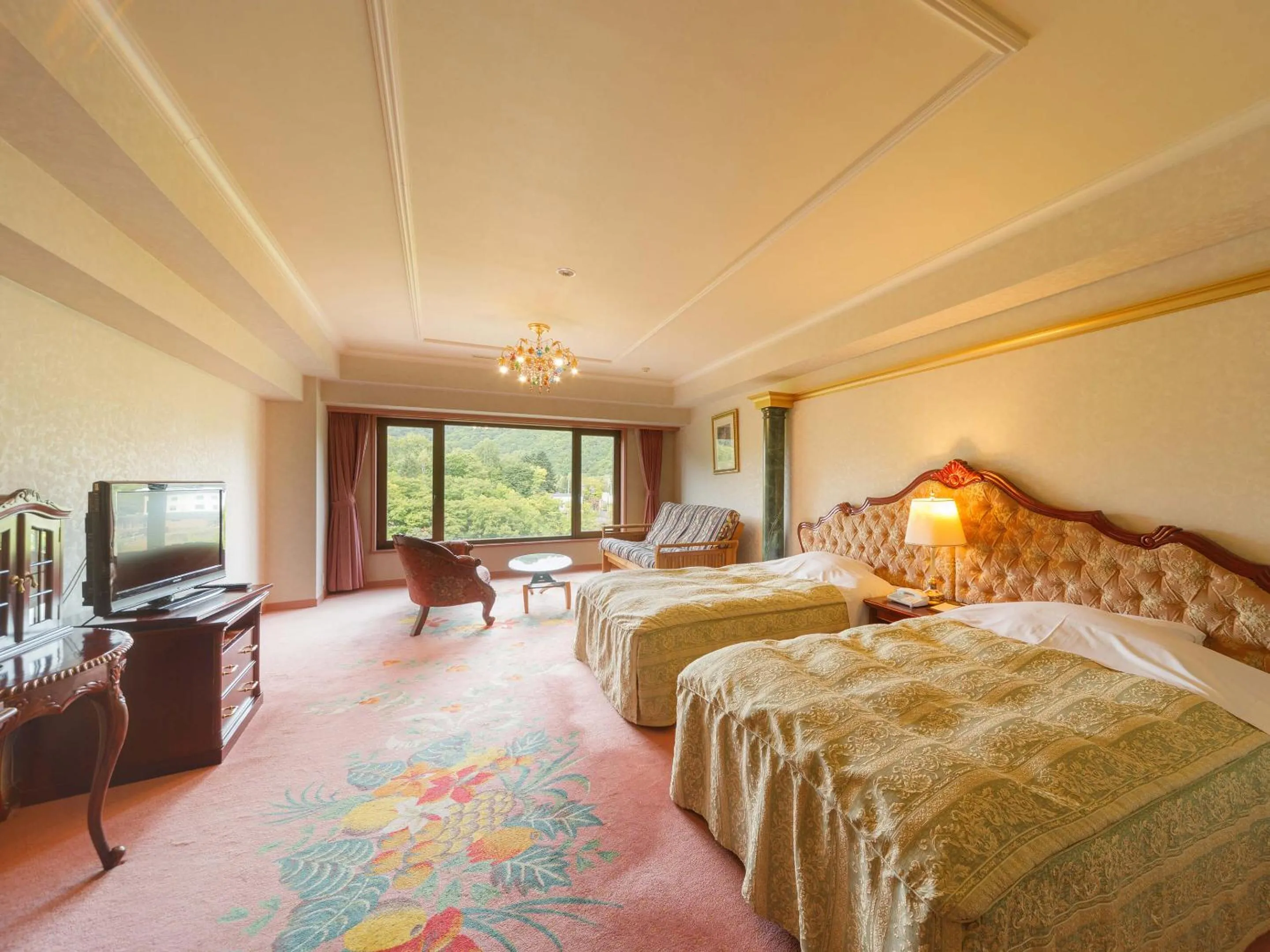 Living room, Bed in Jozankei View Hotel