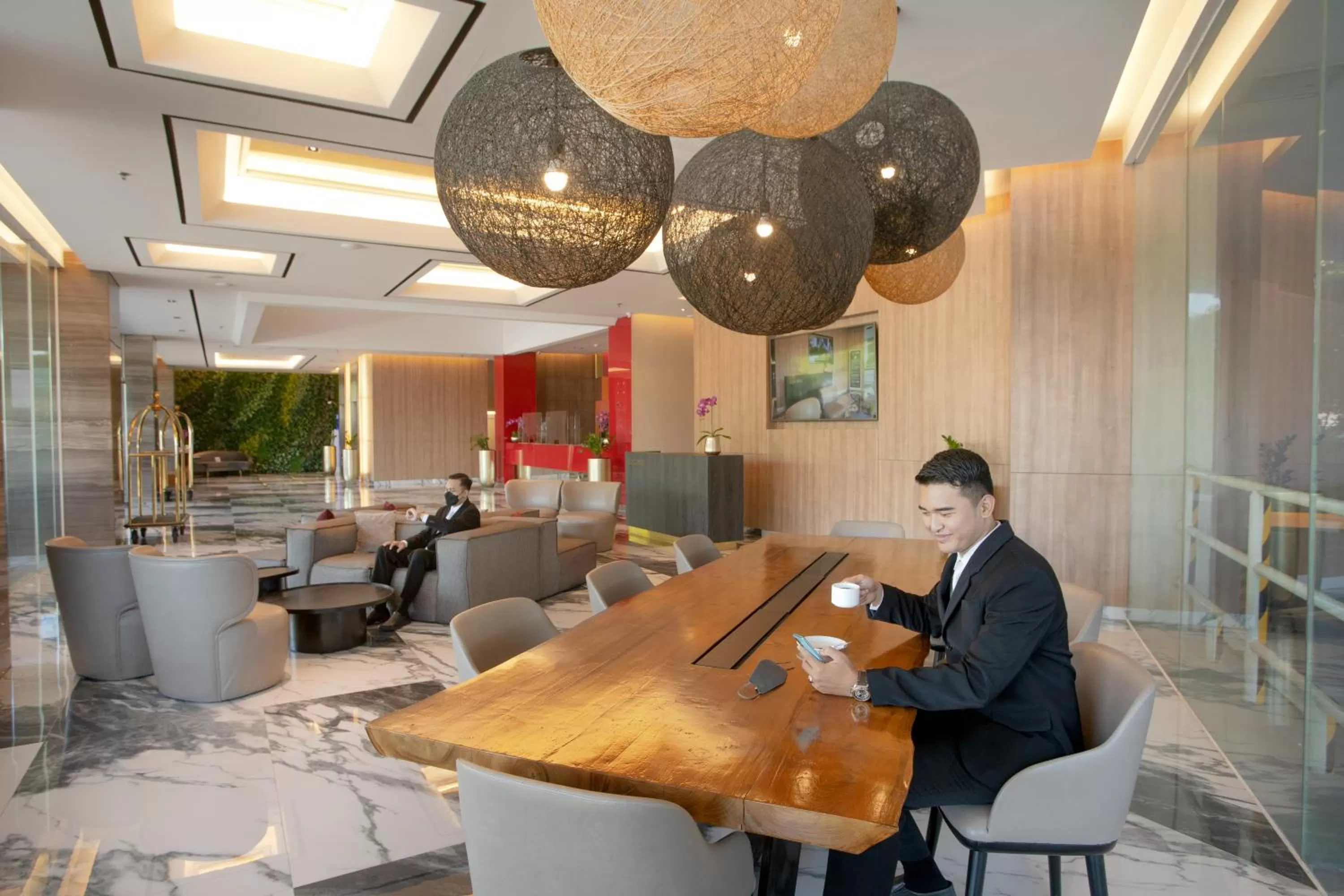 Lobby or reception in The ZHM Premiere Padang