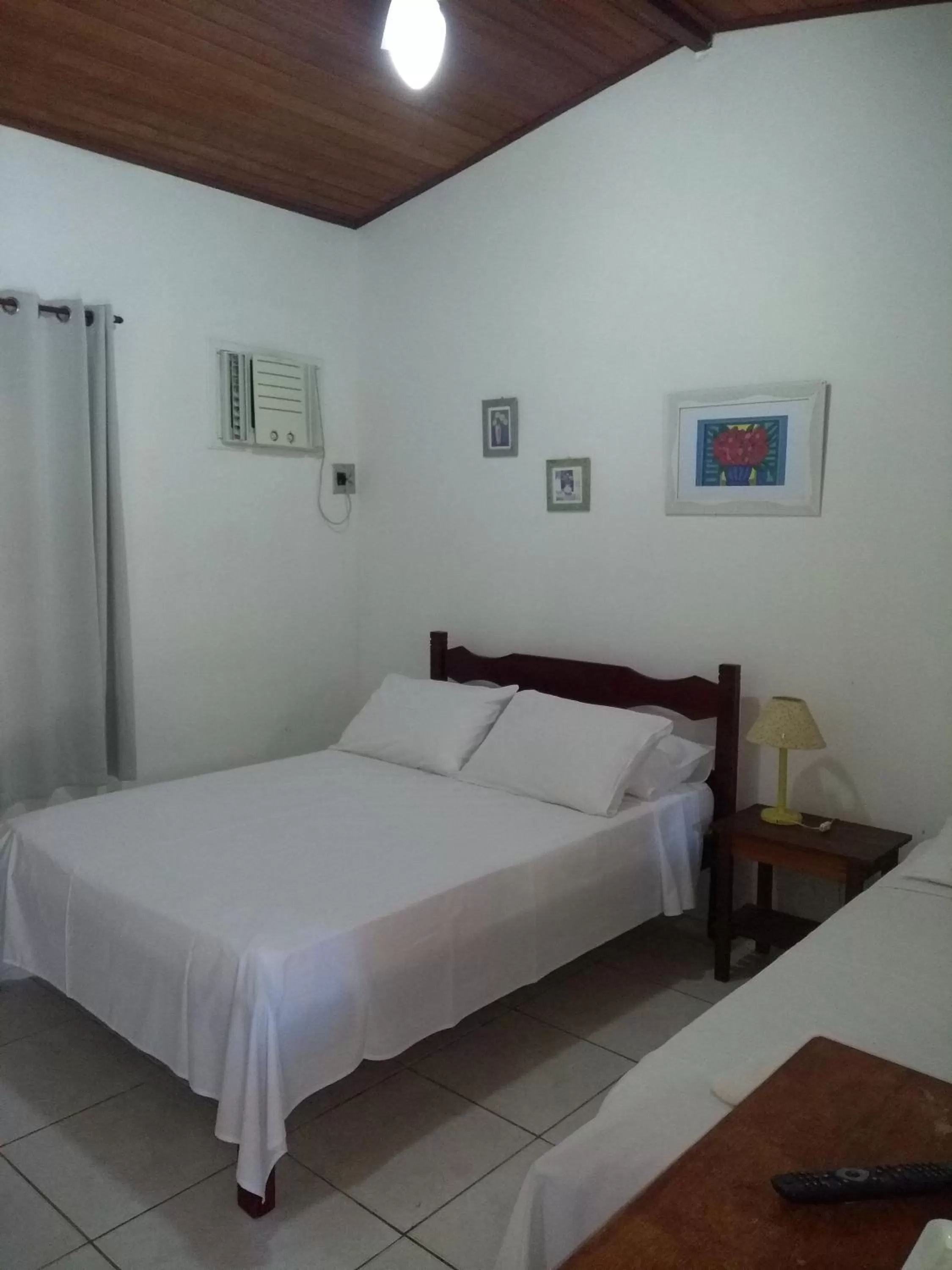 Bed in Pousada Barcarola