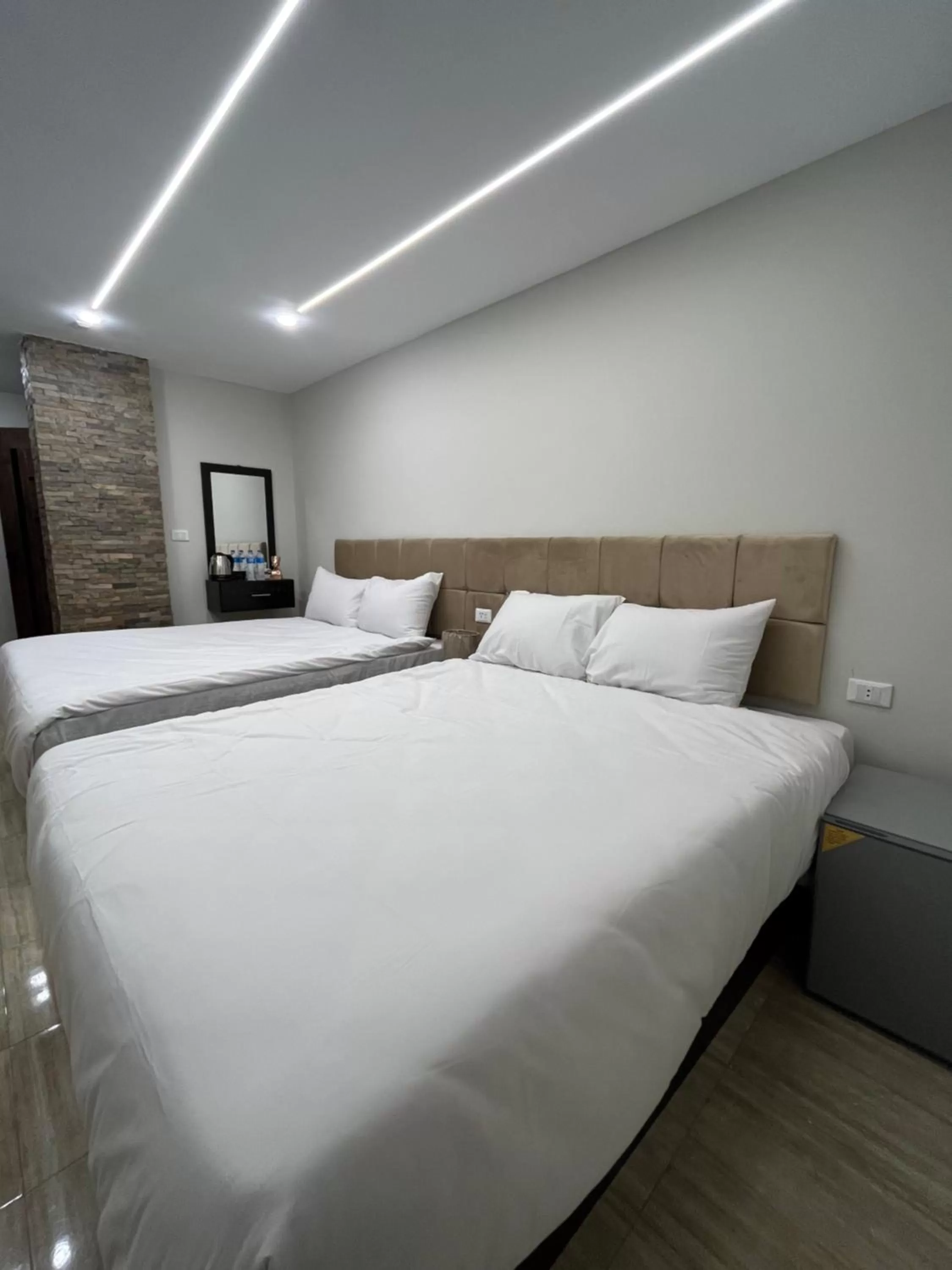 Bed in Crowne Pyramids view inn