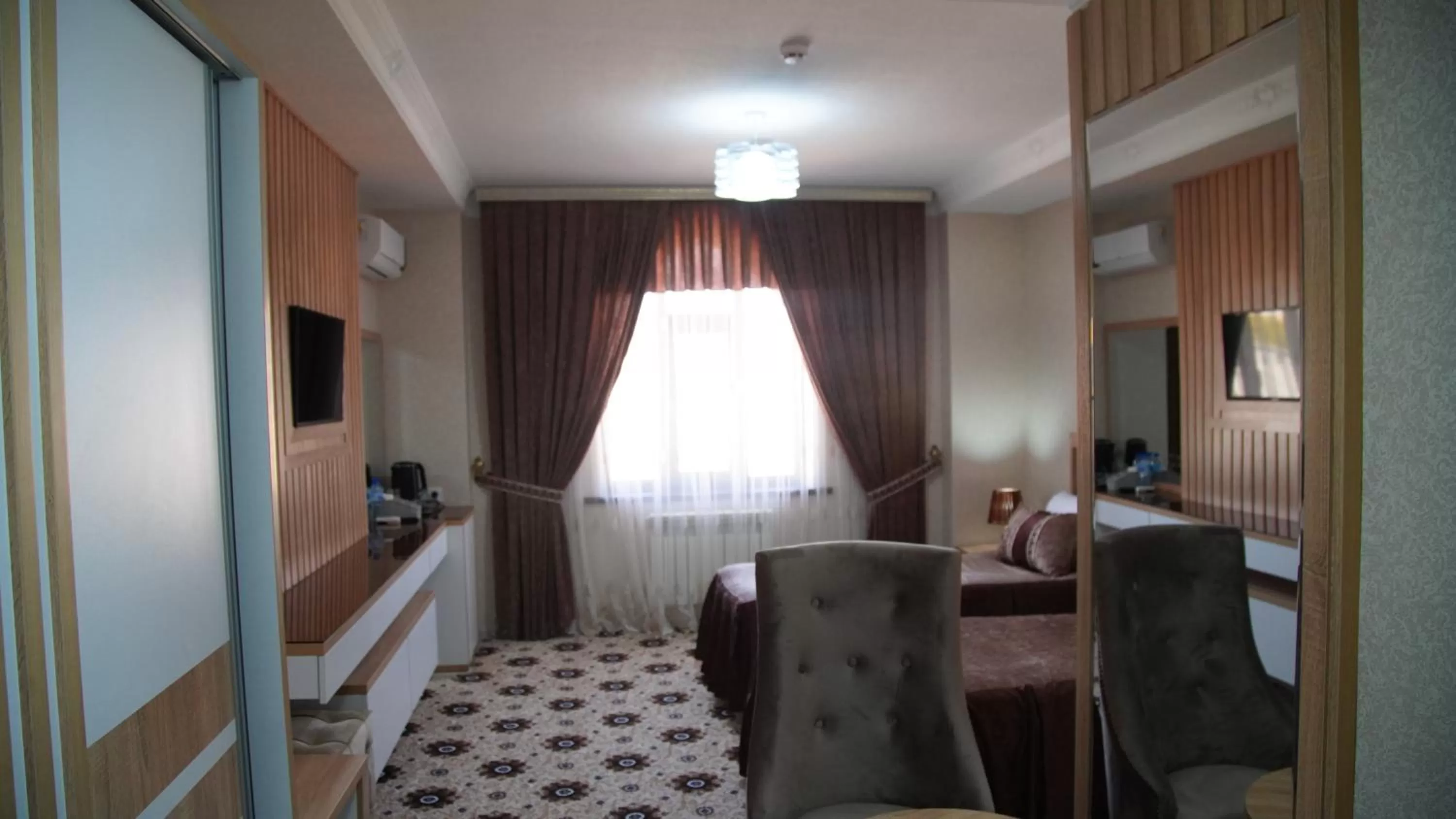 Bed, Dining Area in Sumaya Hotel