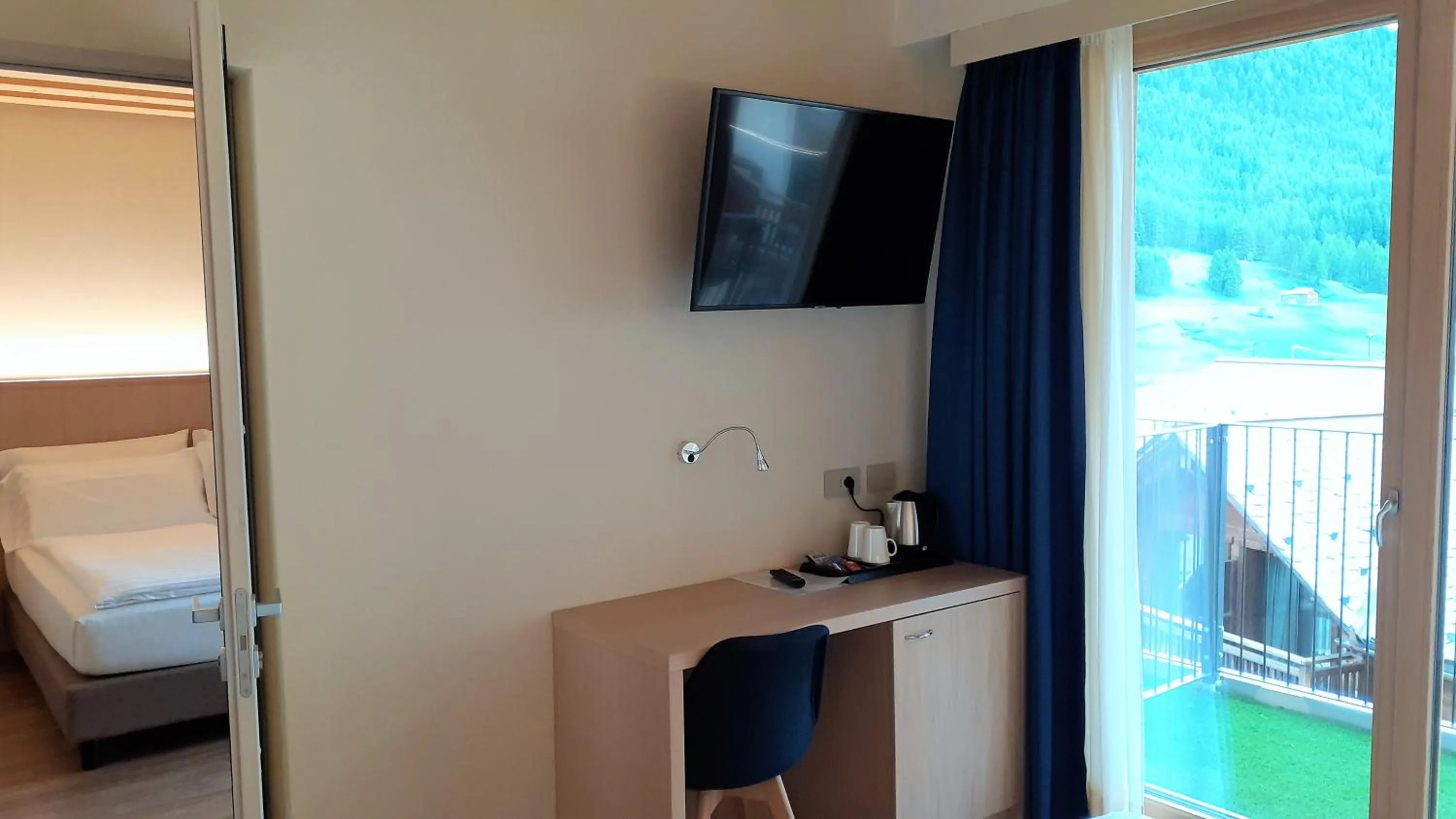 TV and multimedia, Bed in Livì Family Hotel
