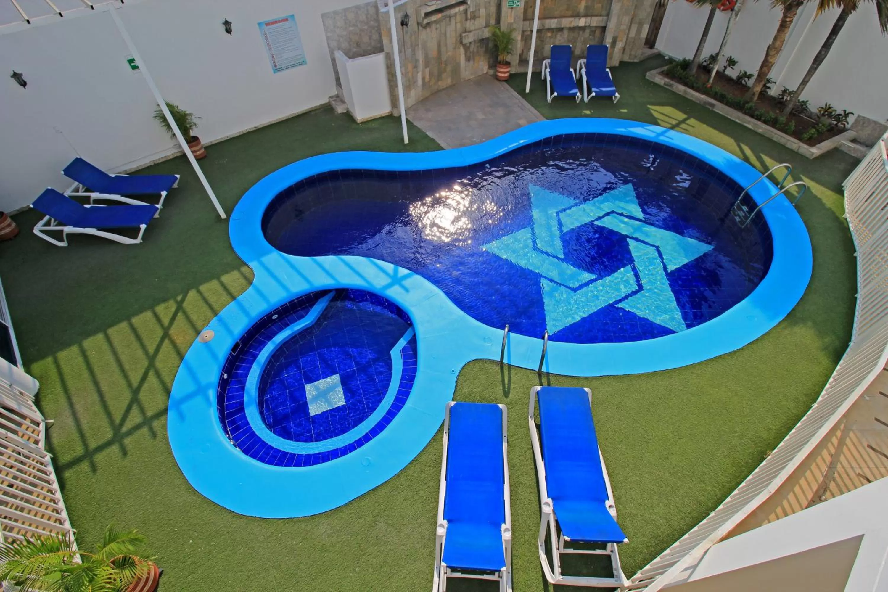 Pool view in Hotel Abi Inn By GEH Suites