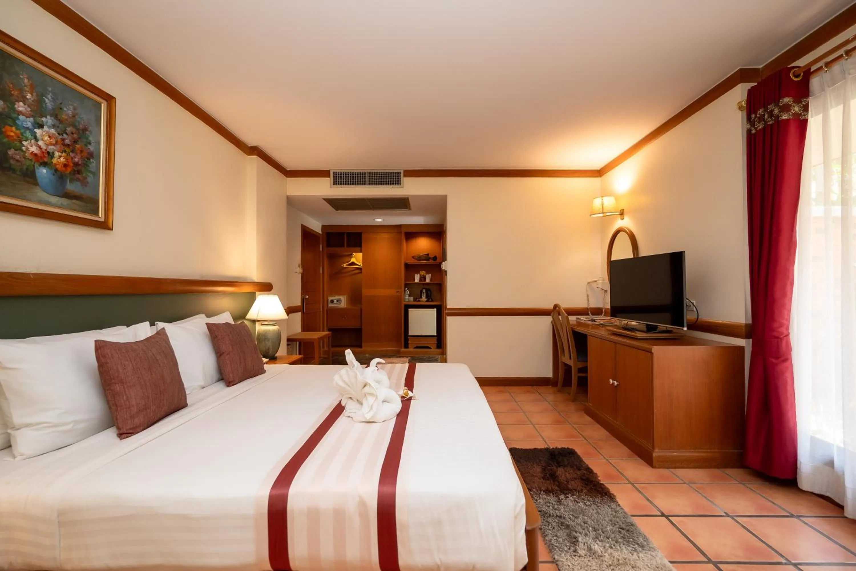 Bed in Comsaed River Kwai Resort