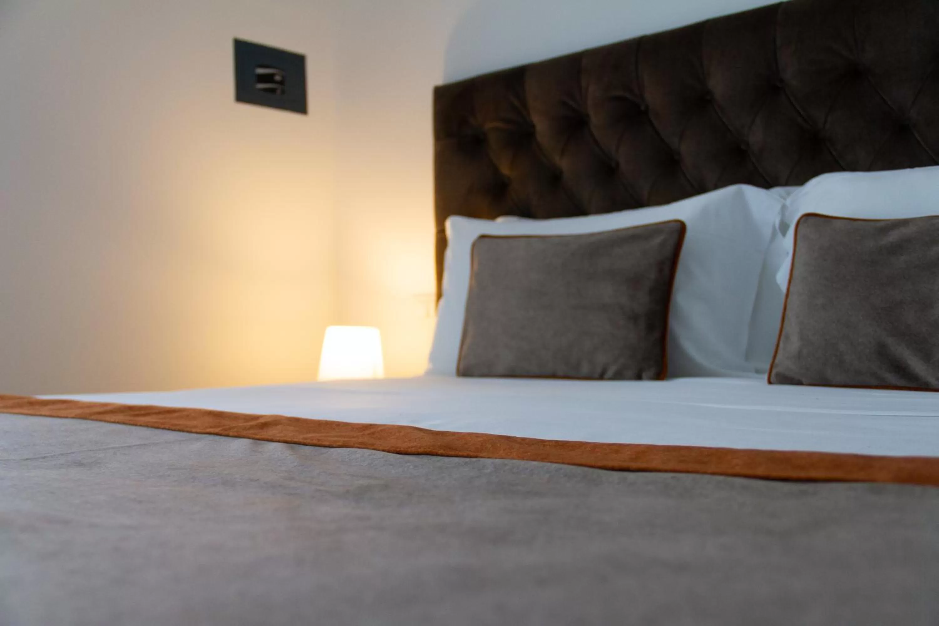 Bed in Michelangelo Vatican Rooms