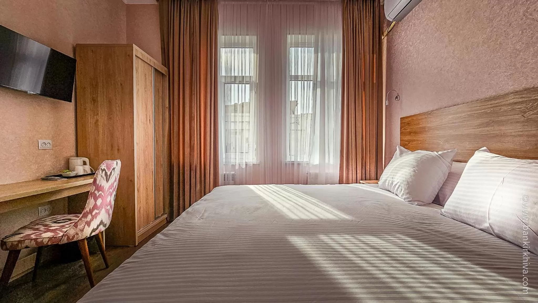 Bed in Hotel Bankir Khiva