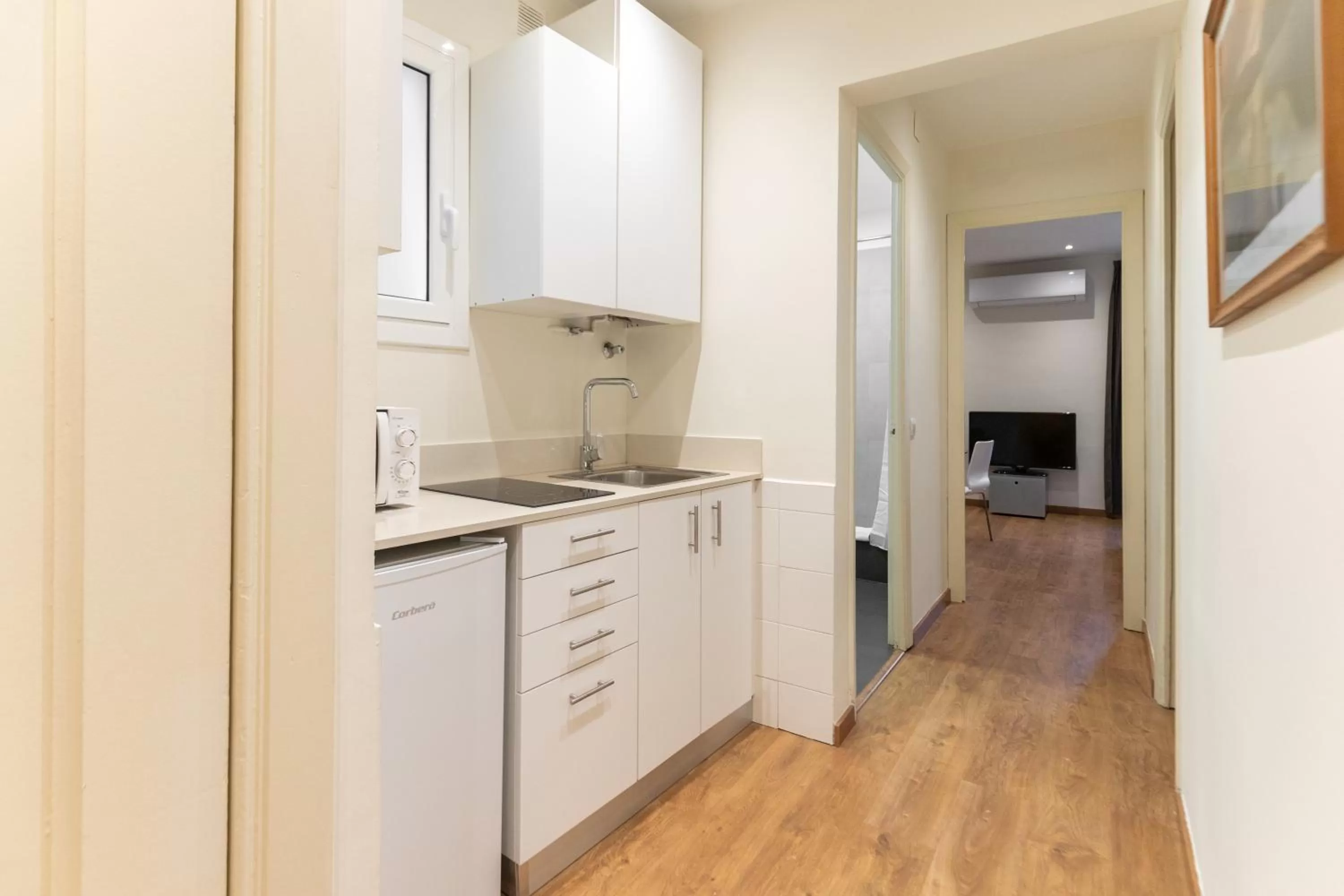 Kitchen or kitchenette in Atica Apartments - by Weflating