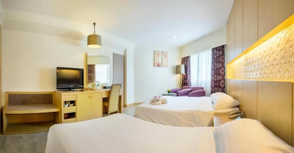 Bed in Jomtien Palm Beach Hotel and Resort