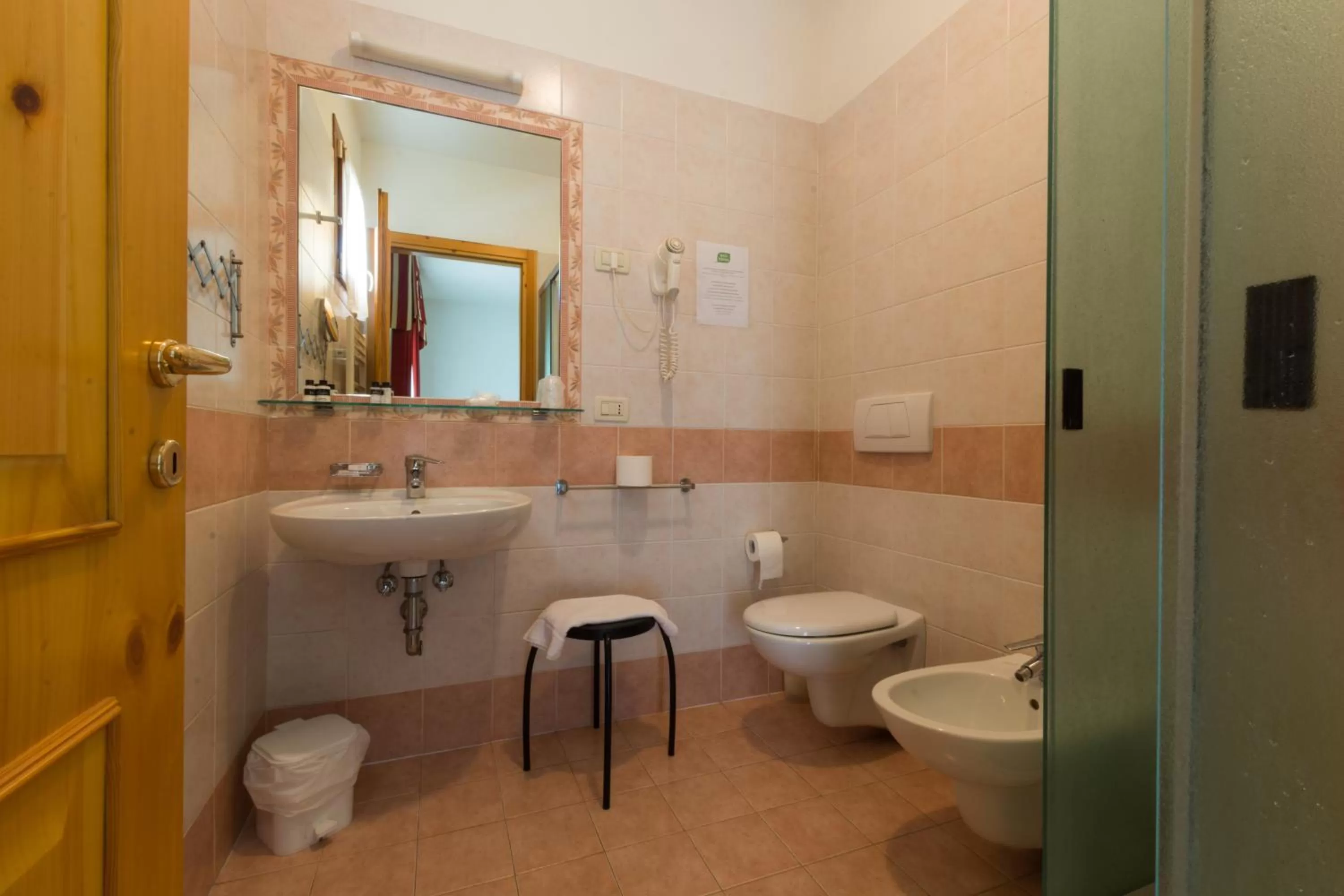 Bathroom in Albergo Dalla Mena