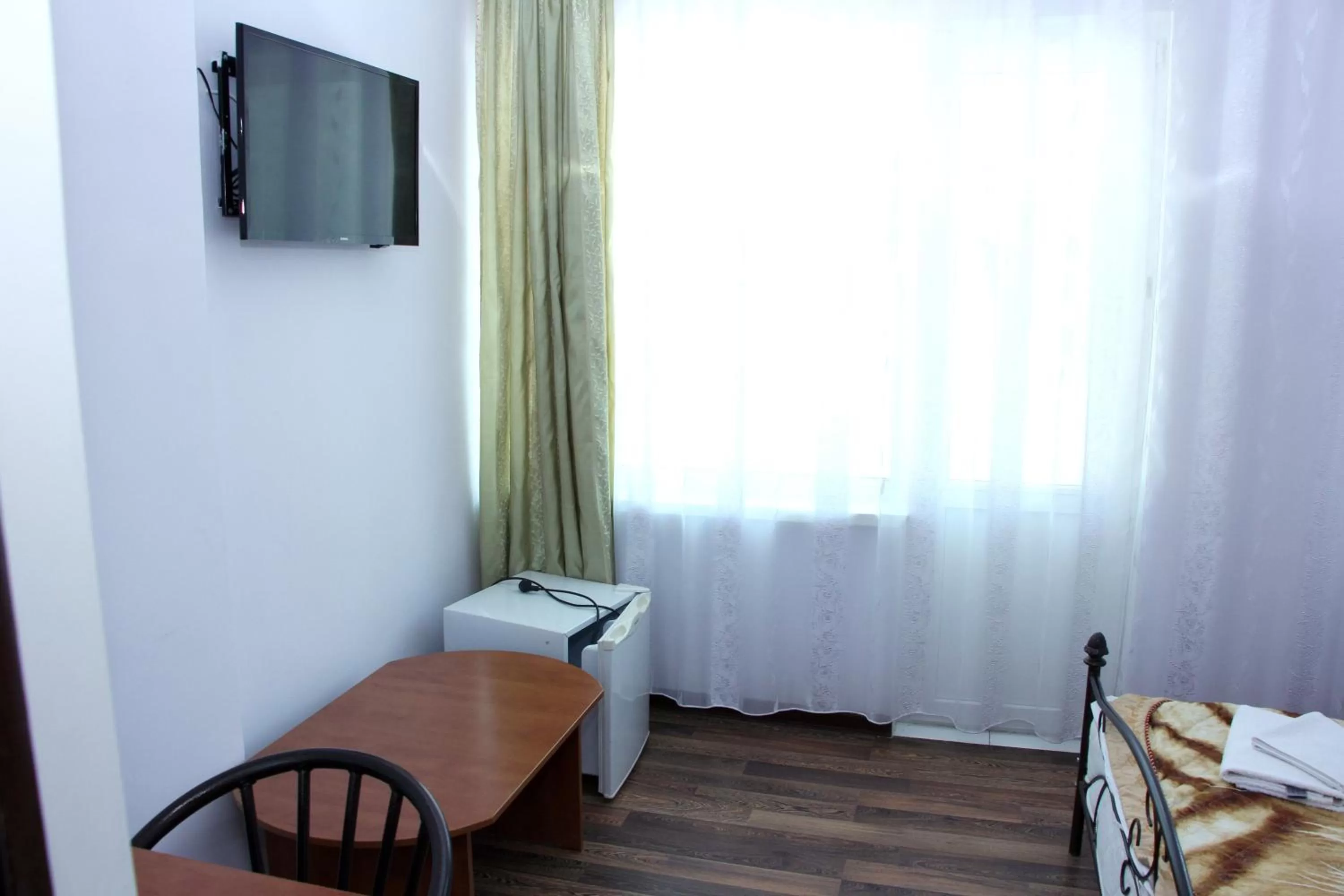 TV/Entertainment Center in Zhaylau Hotel