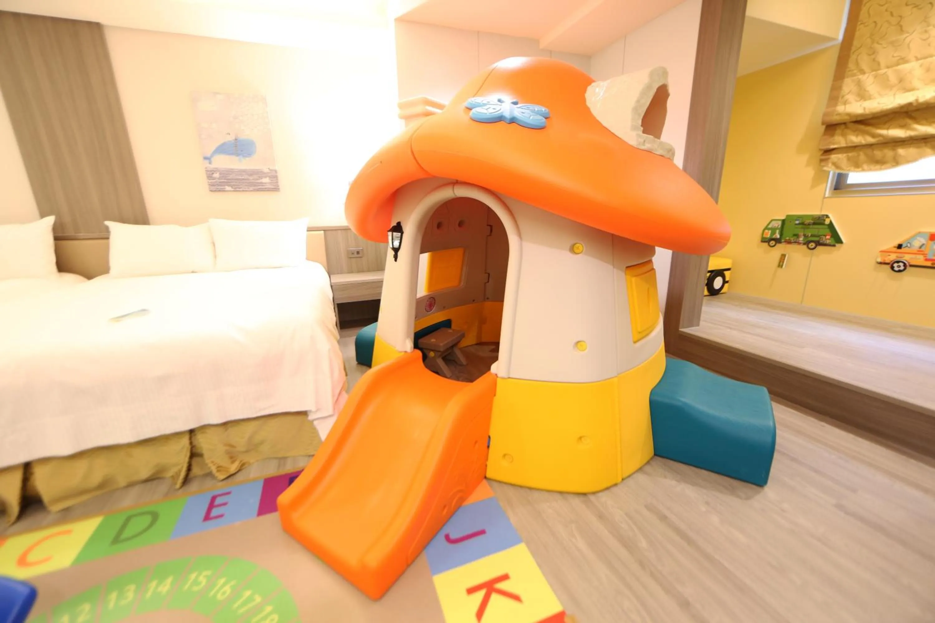 Bed in Grand Earl Hotel